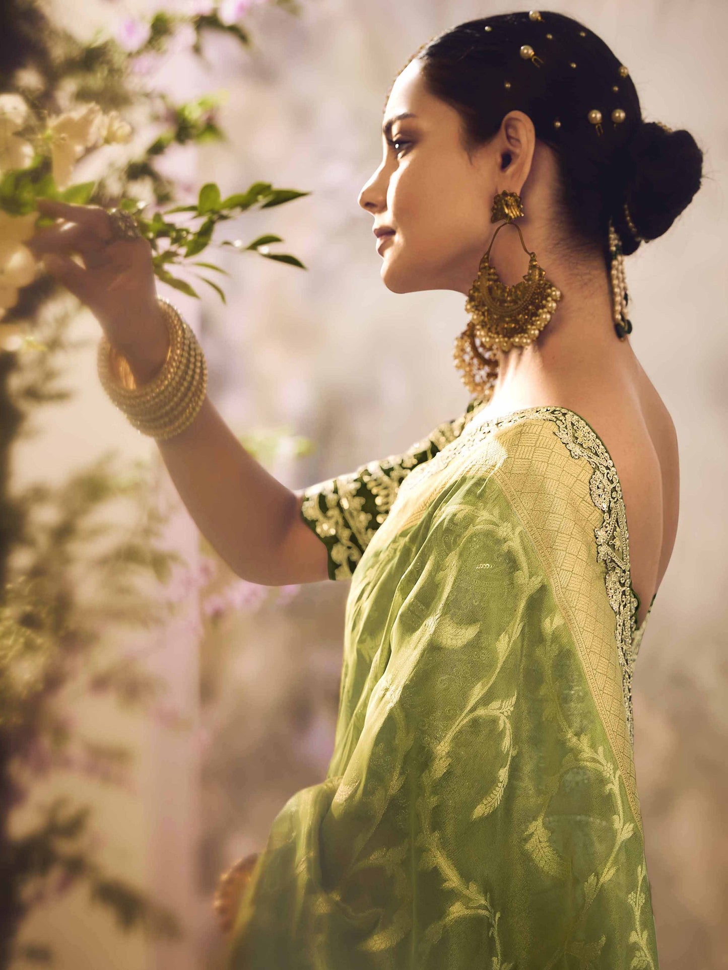 Dhiyona KM Women Green Silk Saree
