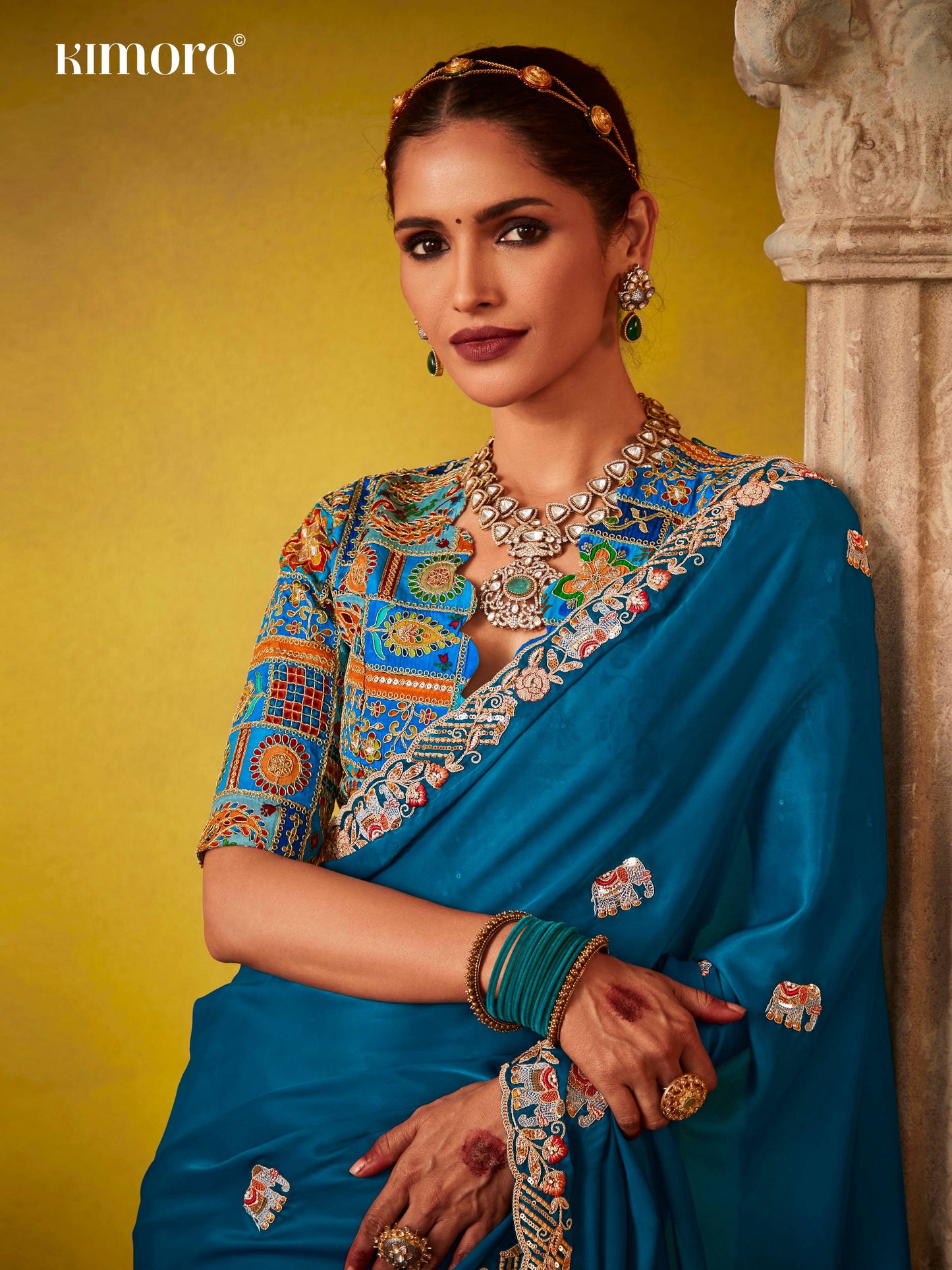 Dhiyona KM Women Regal Blue Saree With Intricately Embroidered Blouse