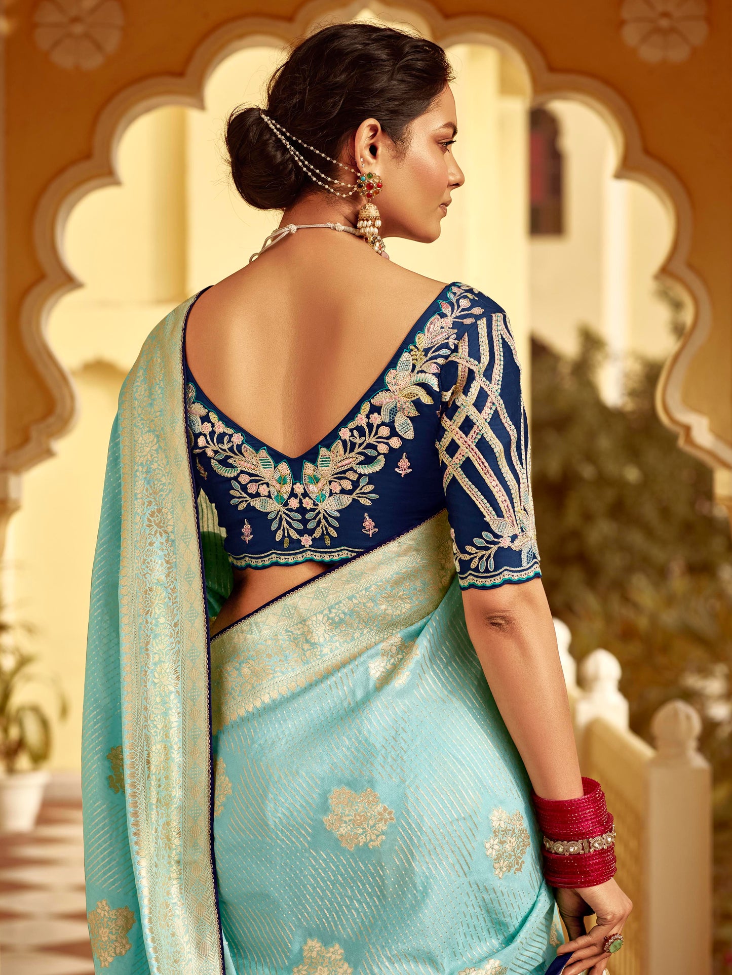 Dhiyona KM Women Sky Blue Banarasi Silk Saree With Zari Weaving