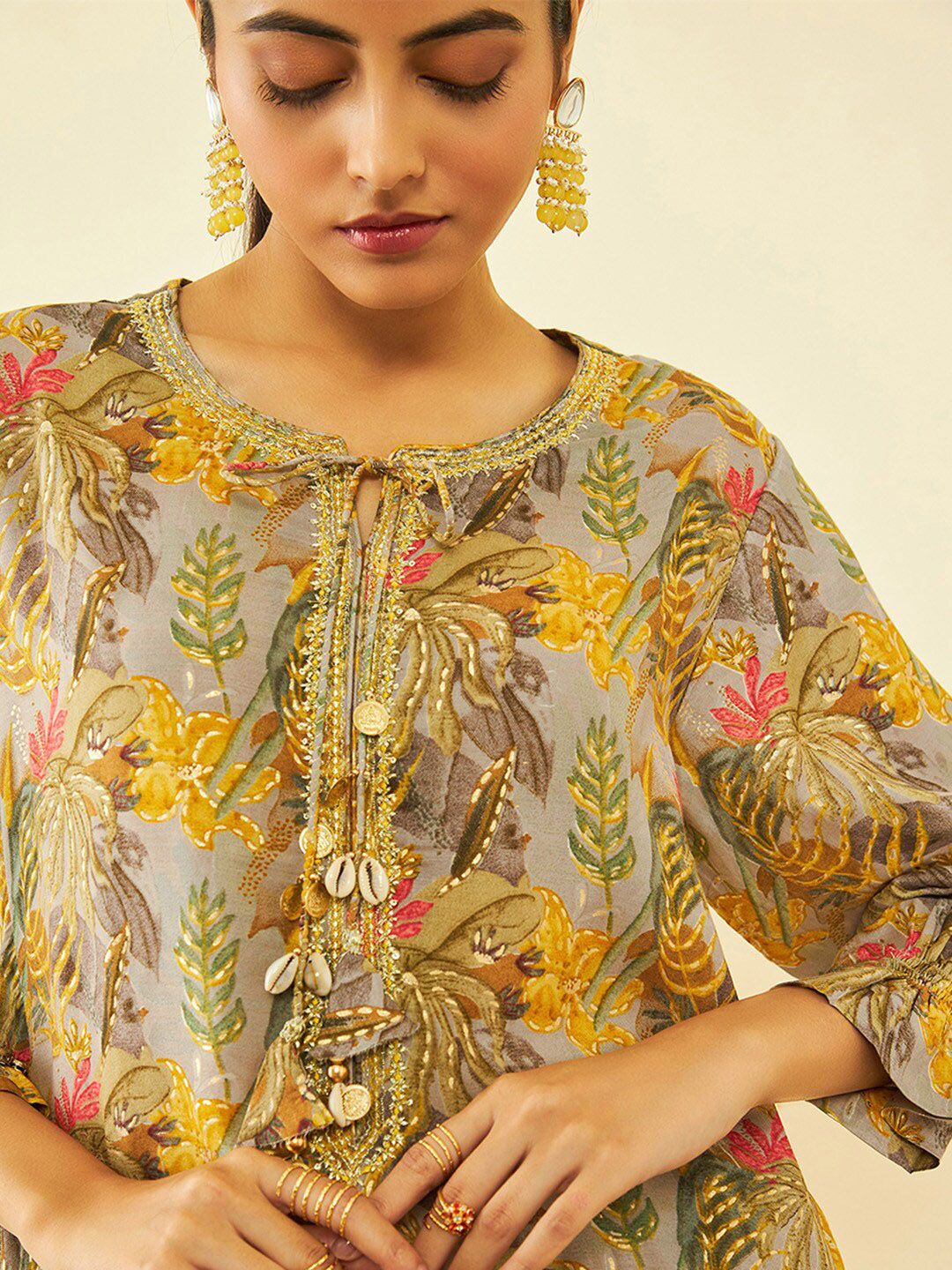 Dhiyona SO Women's Floral Printed Tie Up Neck Sequinned Kurta with Trousers