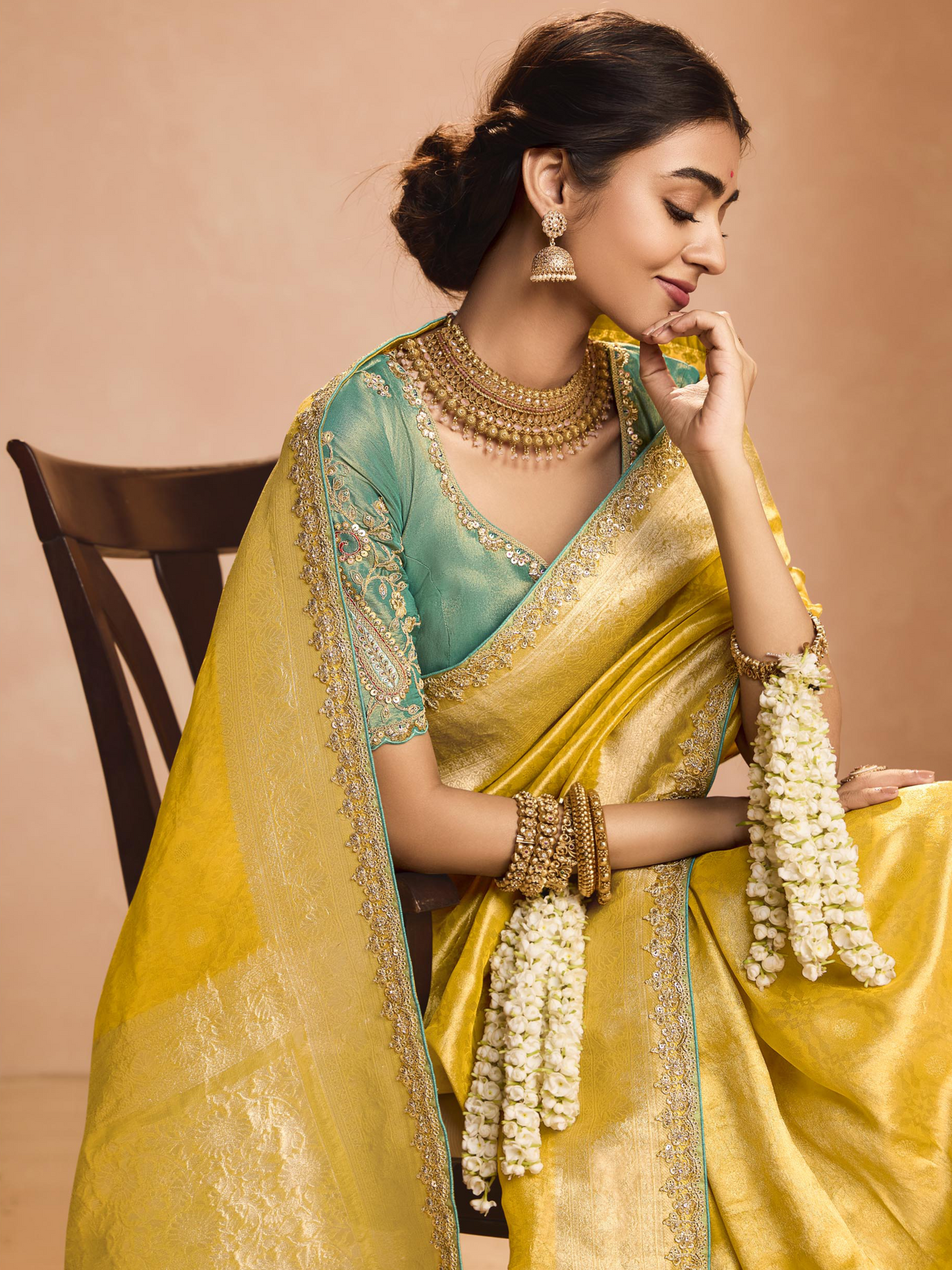 Dhiyona KM Women Yellow Kanjivaram Silk Saree With Sea Green Embroidered Blouse