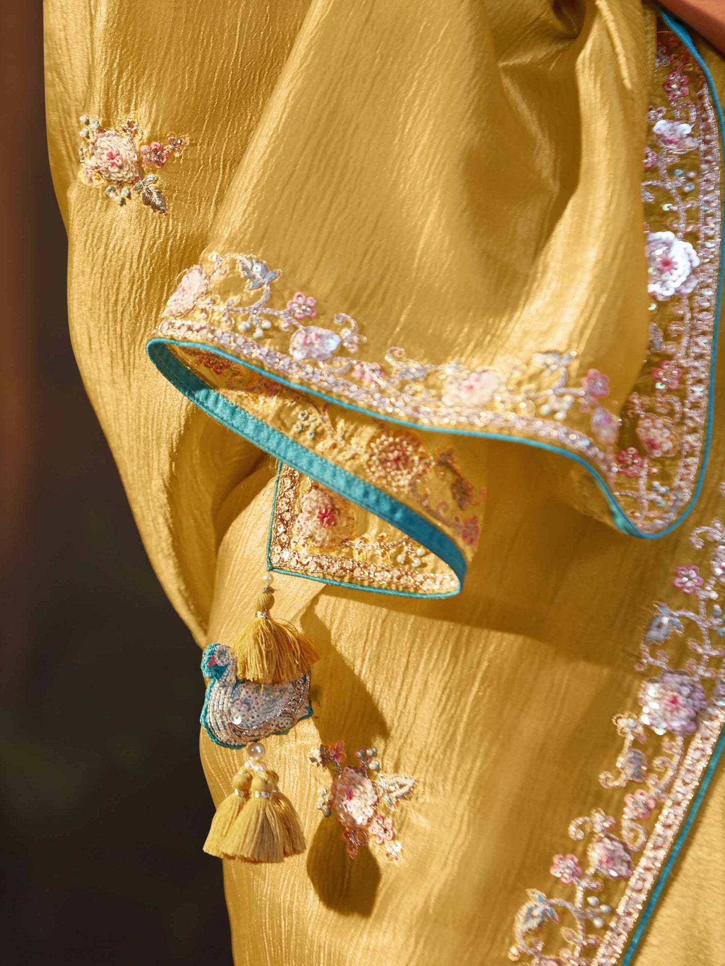 Dhiyona KM Women Yellow Silk Embroidered Butta Saree With Teal Blouse