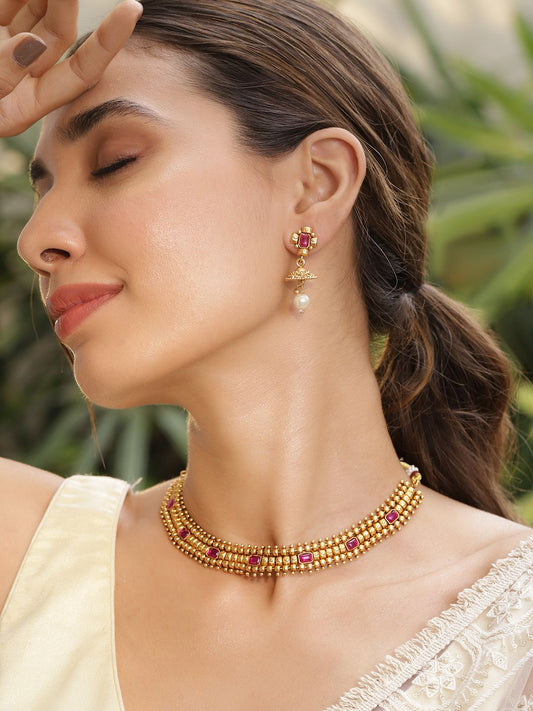 Dhiyona RJ Women's 22K Gold Plated Handcrafted Ruby Stone Studded and Gold Beaded Jewellery Set