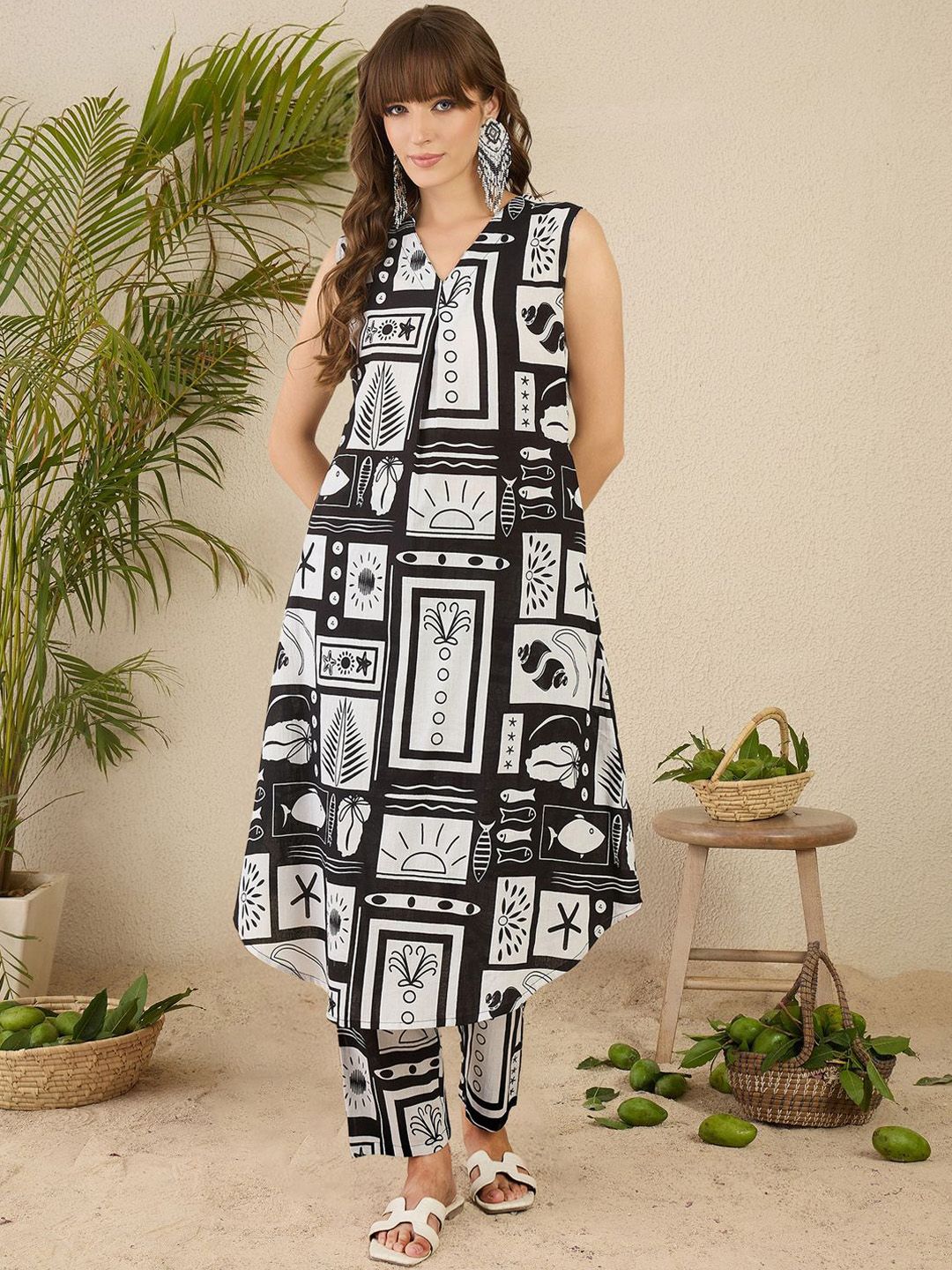 Dhiyona IE Women Geometric Printed Aline Calf Length Kurta with Trousers