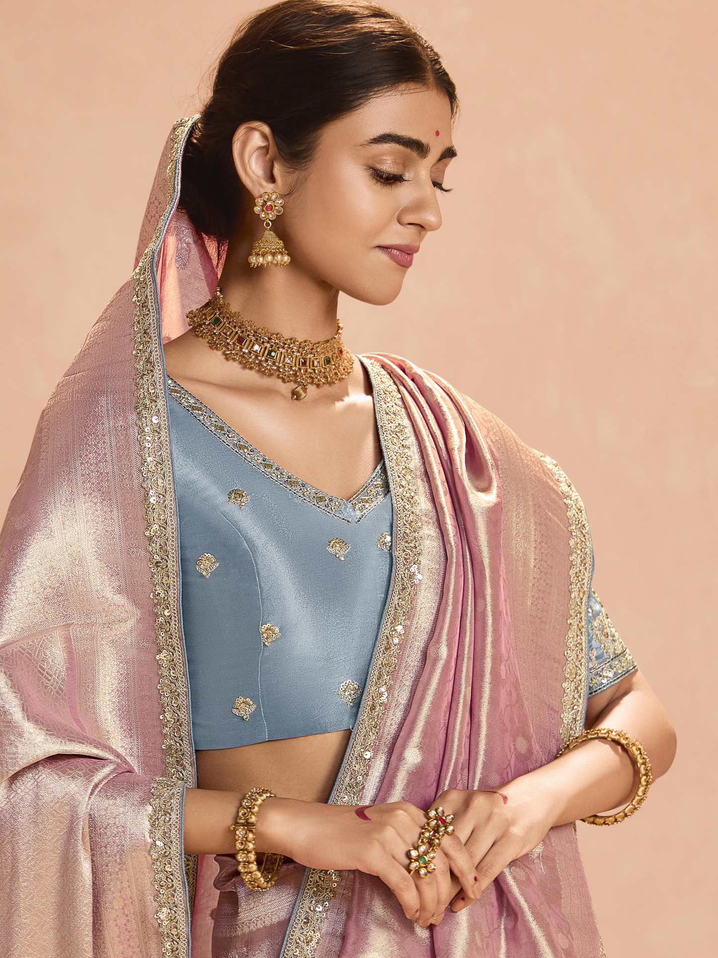 Dhiyona KM Women Blush Pink Kanjivaram Silk Saree With Elegant Blue Embroidered Blouse “ Subtle Glamour