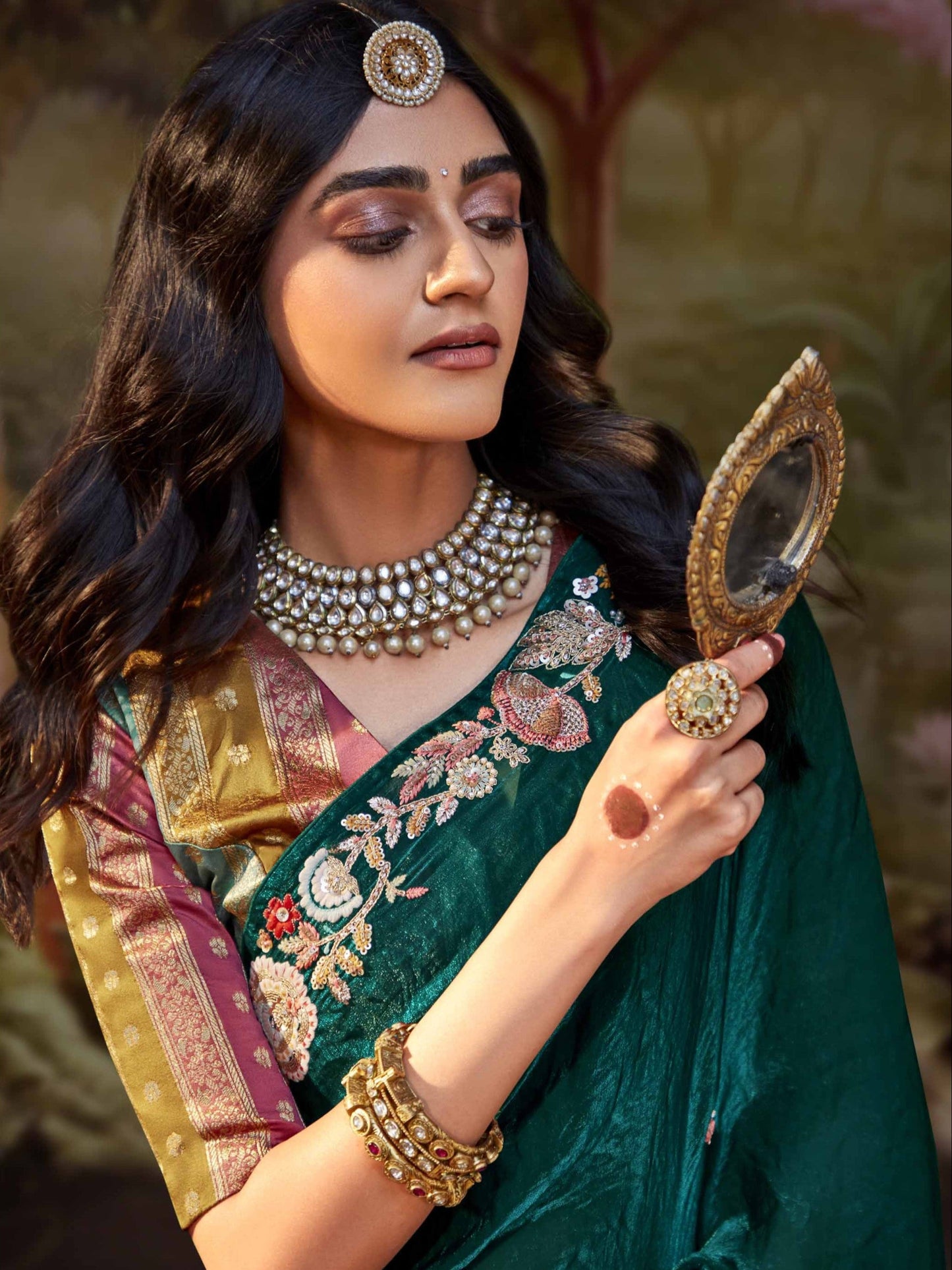 Dhiyona KM Women Forest Green Tissue Silk Saree With Embroidered Designer Blouse