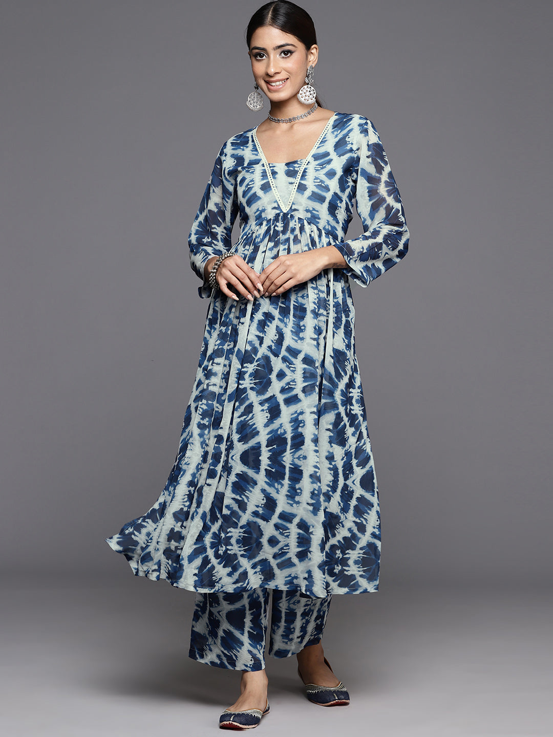 Dhiyona VR Women's Blue Shibori Printed V-Neck A-Line Kurta Paired With Tonal Printed Bottom