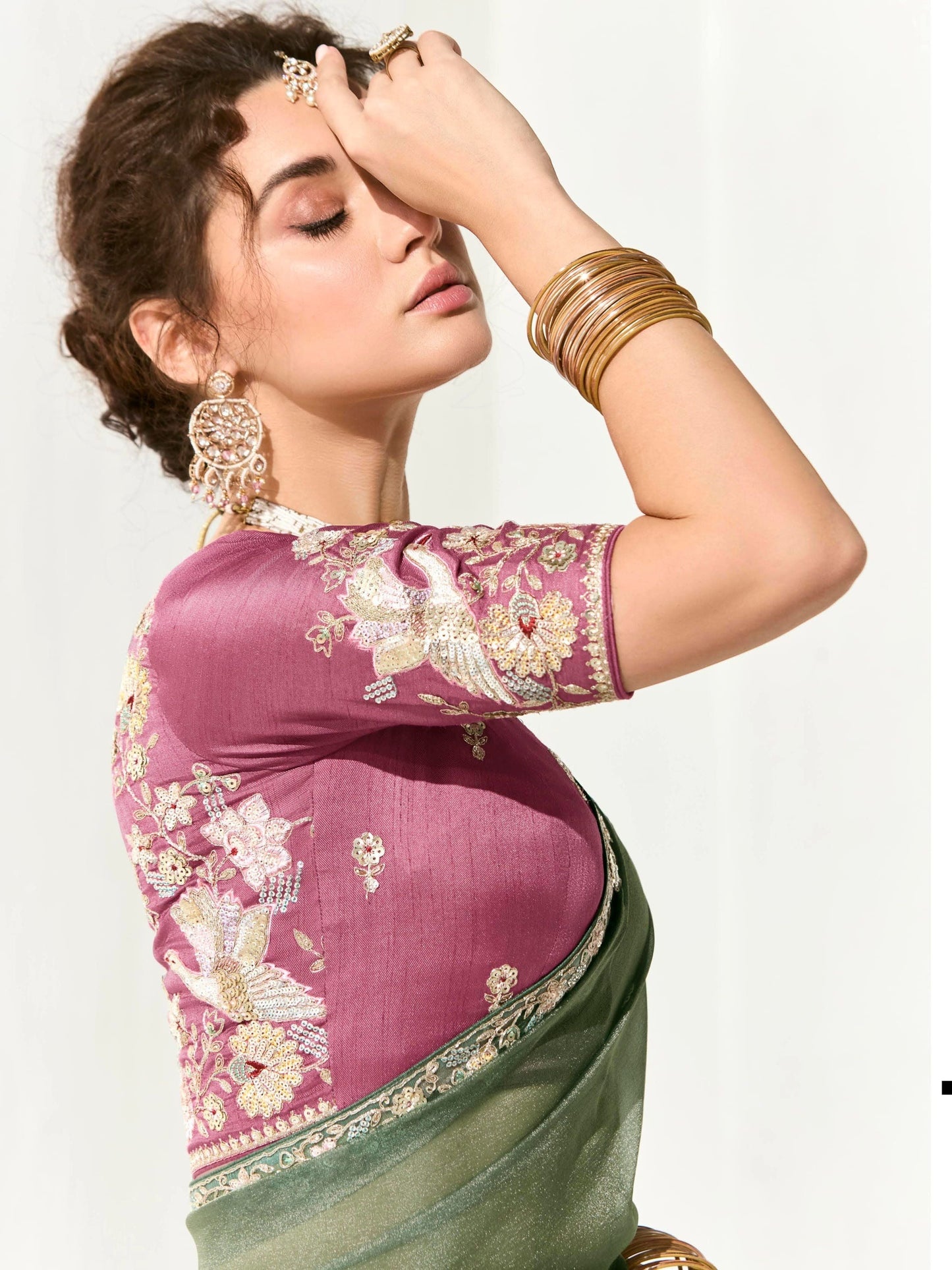 Dhiyona KM Women Mint Green Shimmer Saree With Ornate Mauve Purple Embroidered Blouse