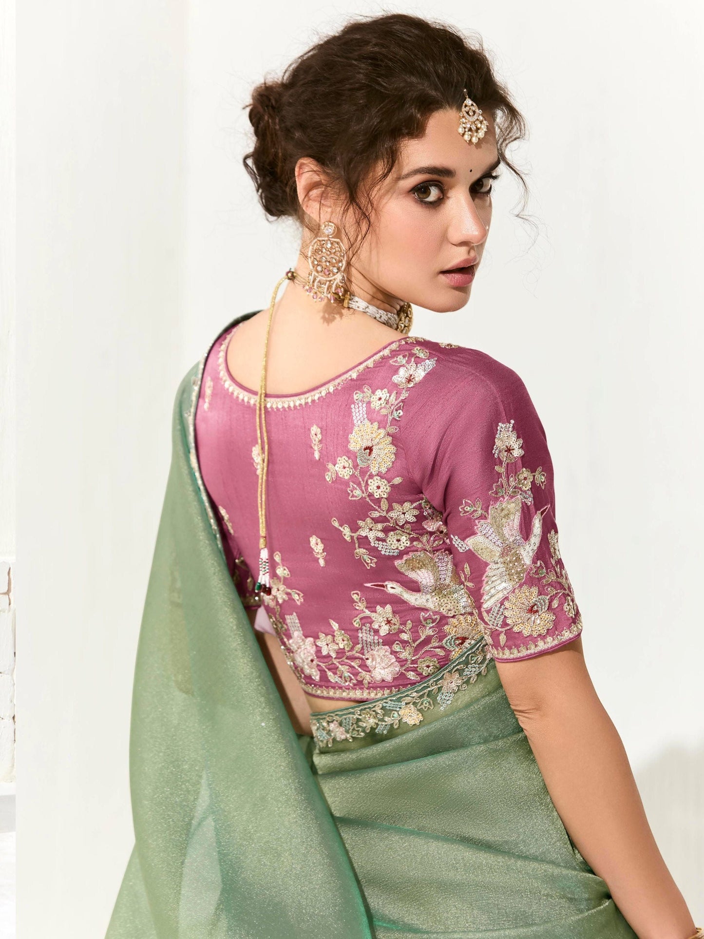Dhiyona KM Women Mint Green Shimmer Saree With Ornate Mauve Purple Embroidered Blouse