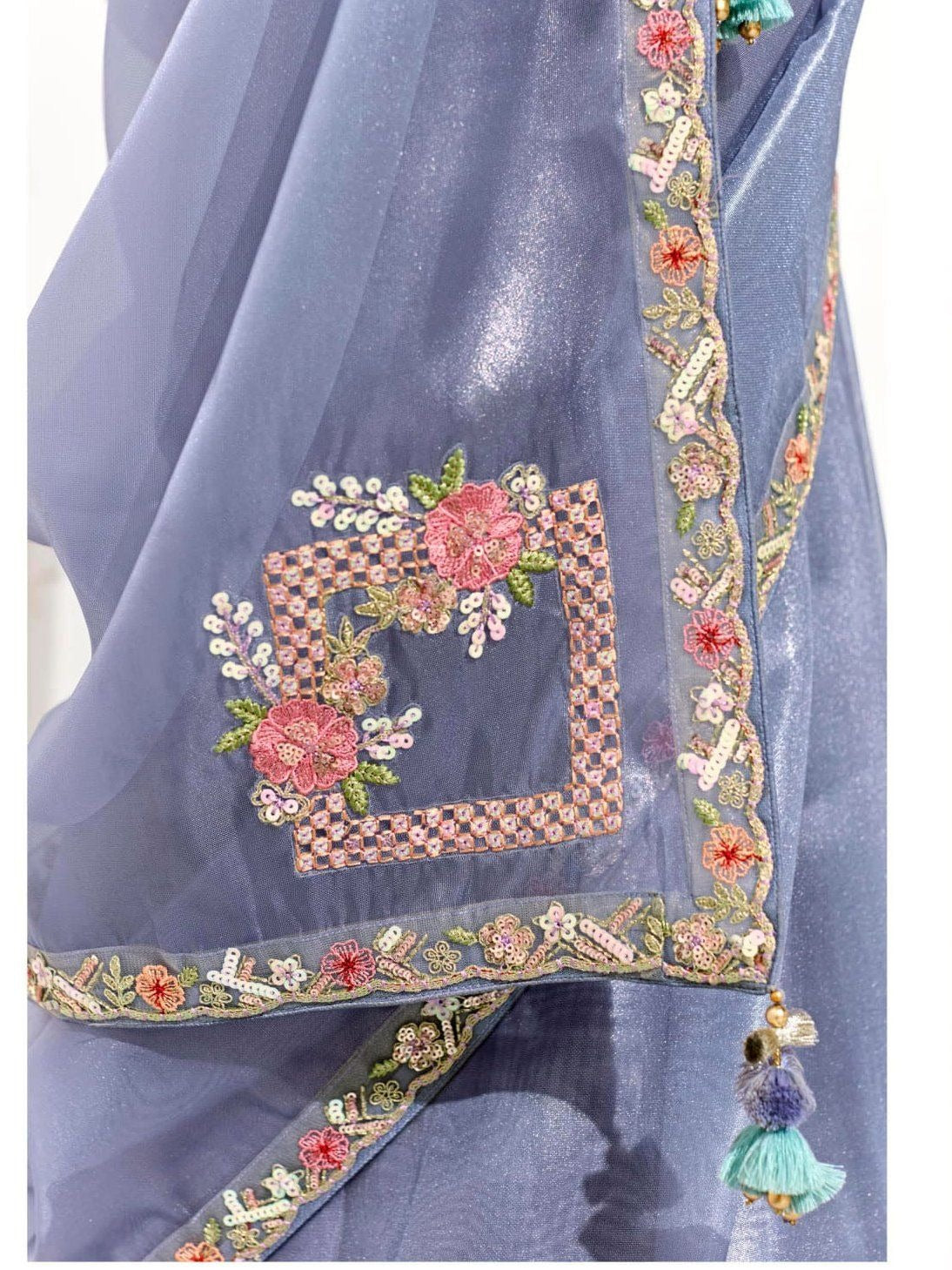 Dhiyona KM Women Premium Blue Organza Saree With Embroidered Green Blouse