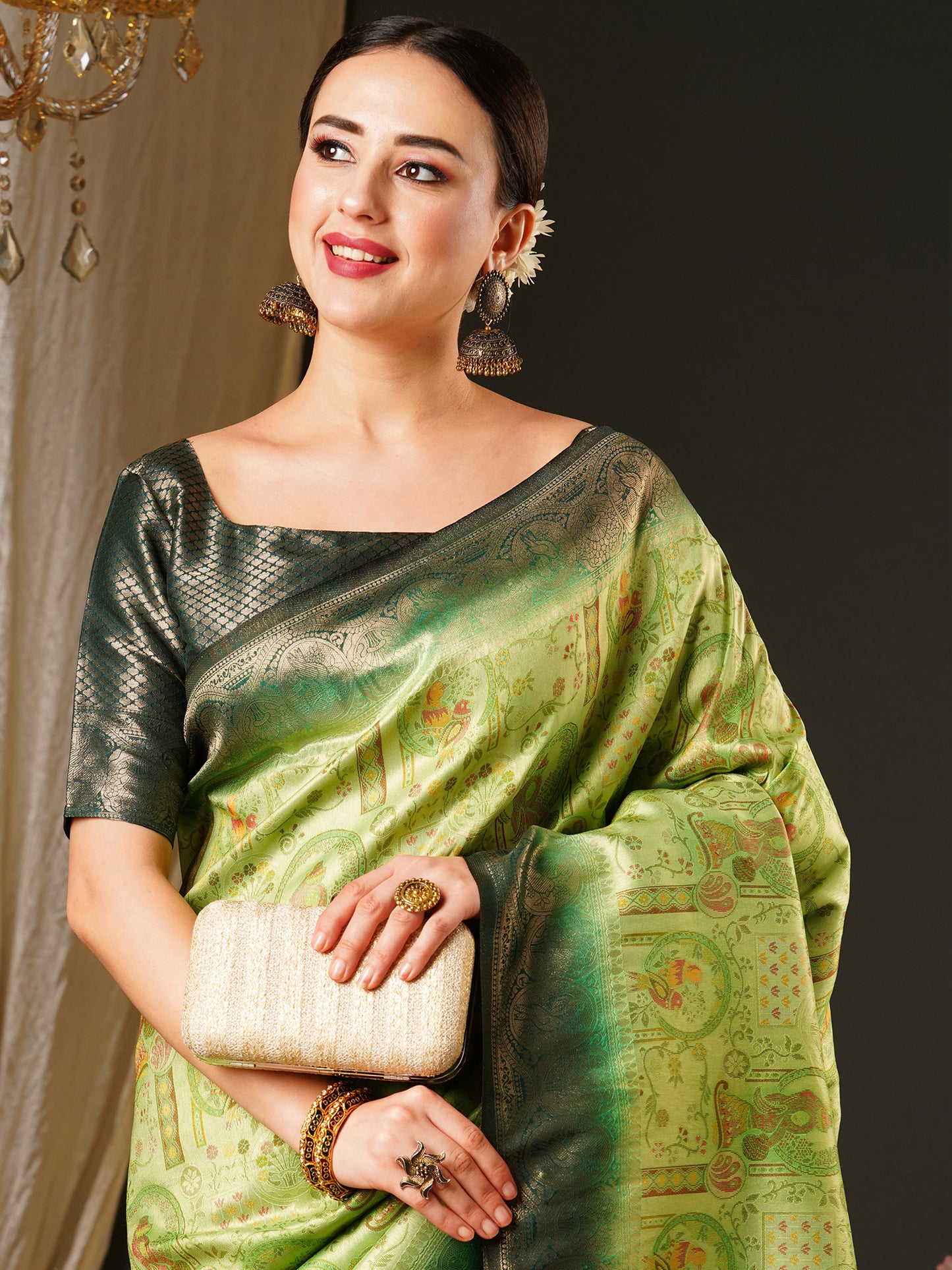 Women's Kanjeevaram Silk Light Green Woven Design Celebrity Saree With Blouse Piece