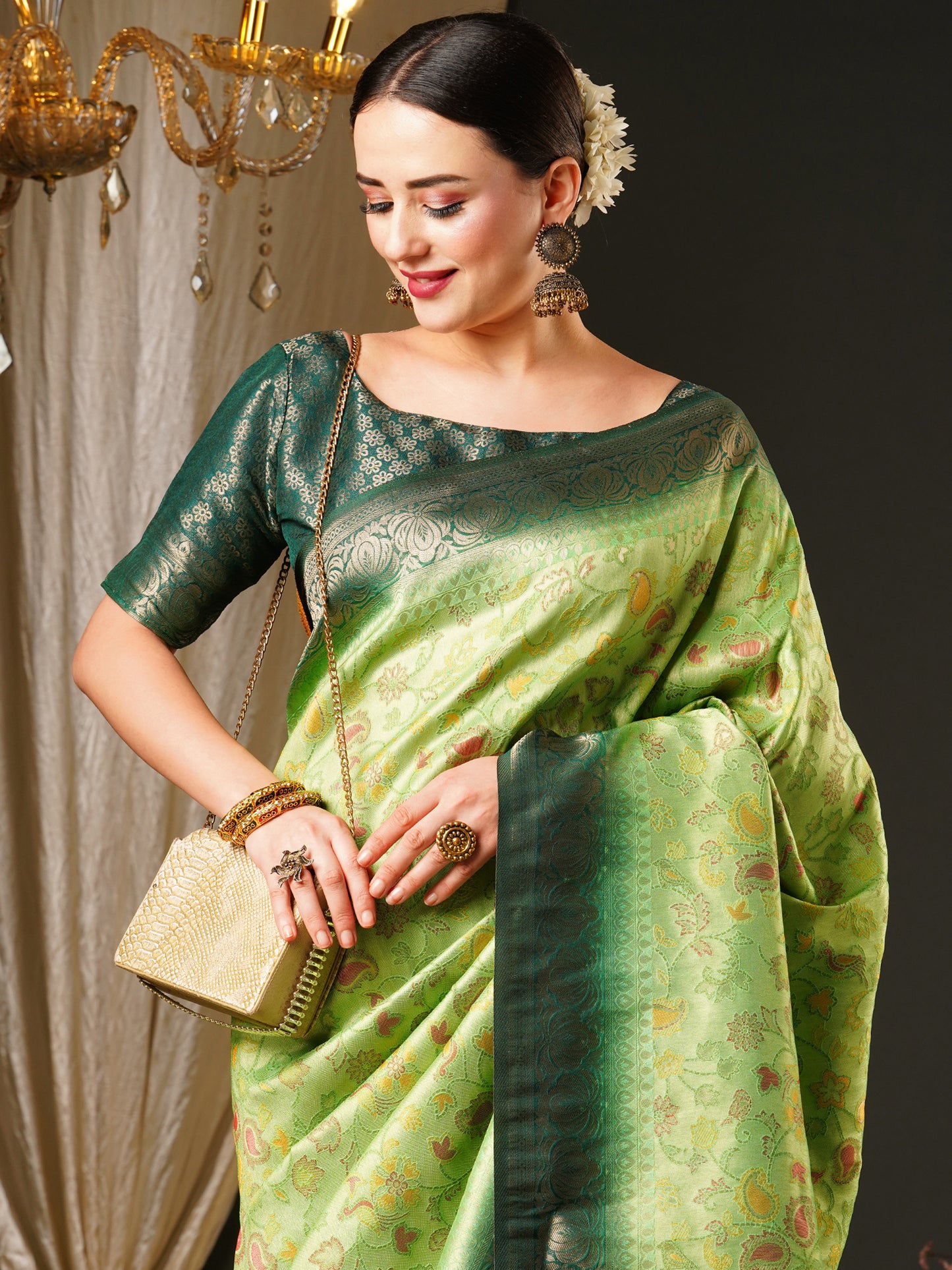 Women's Kanjeevaram Silk Light Green Woven Design Celebrity Saree With Blouse Piece