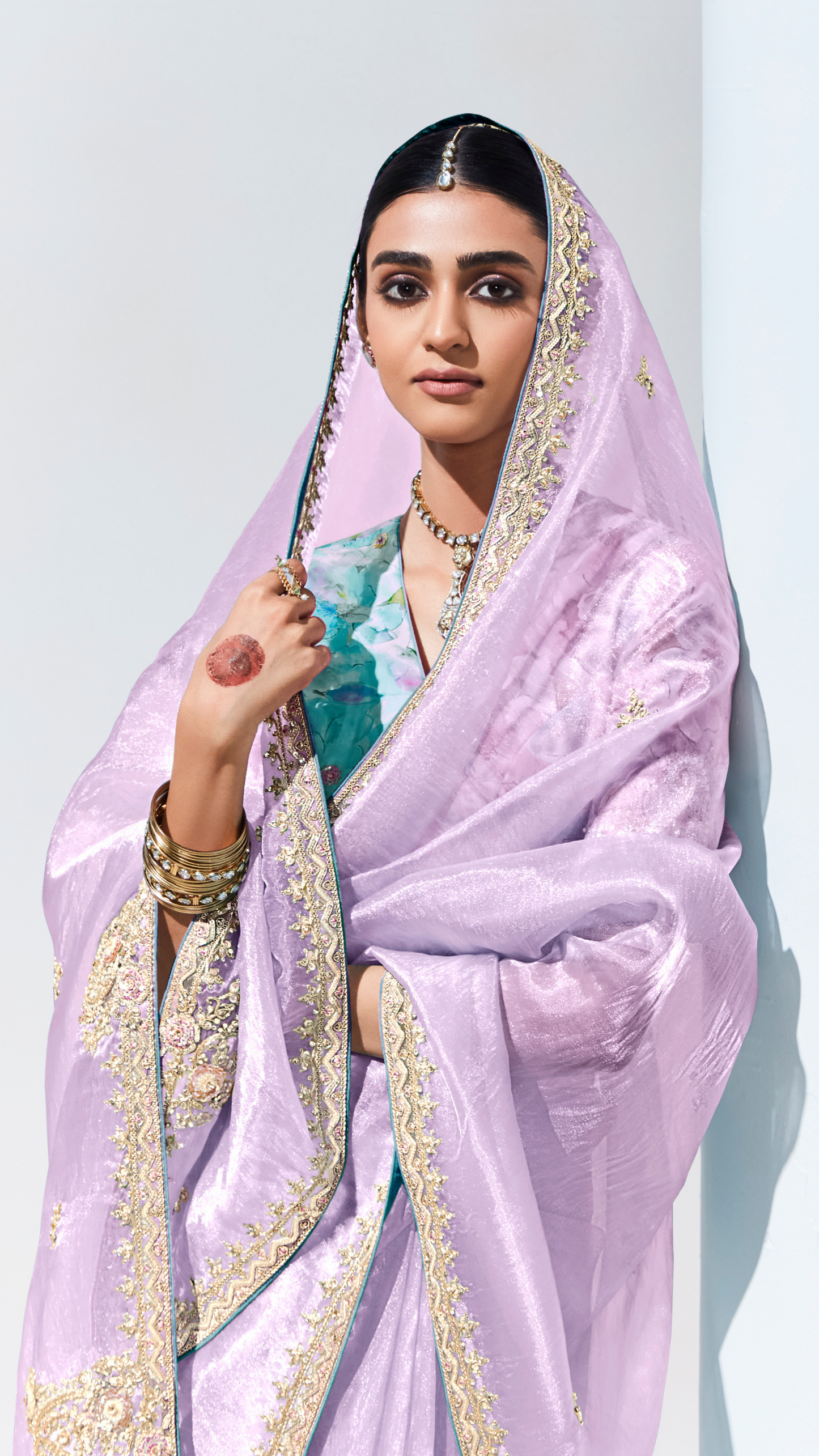 Dhiyona KM Women Royal Purple Silk Saree With Aqua Blue Blouse
