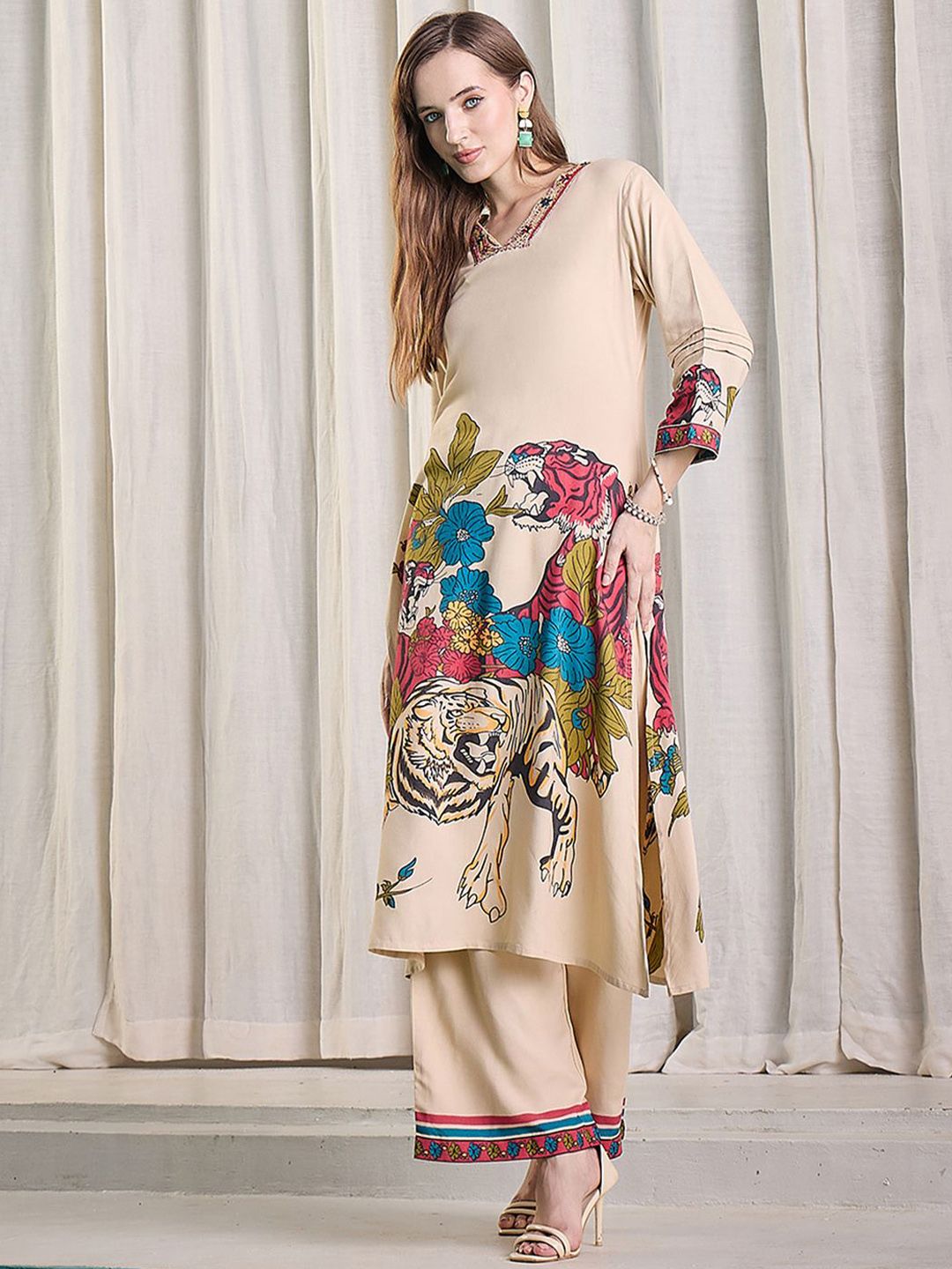 Women Animal Printed Kurta with Trousers