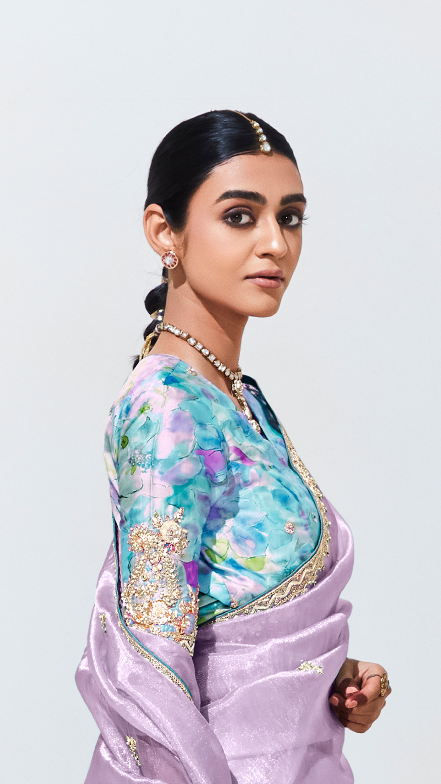 Dhiyona KM Women Royal Purple Silk Saree With Aqua Blue Blouse