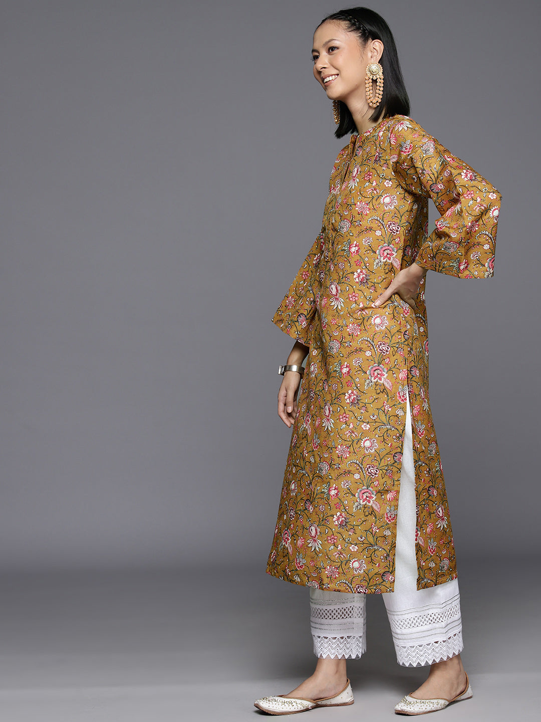 Dhiyona VR Women's Mustard Floral Printed Straight Kurta With Flared Sleeves