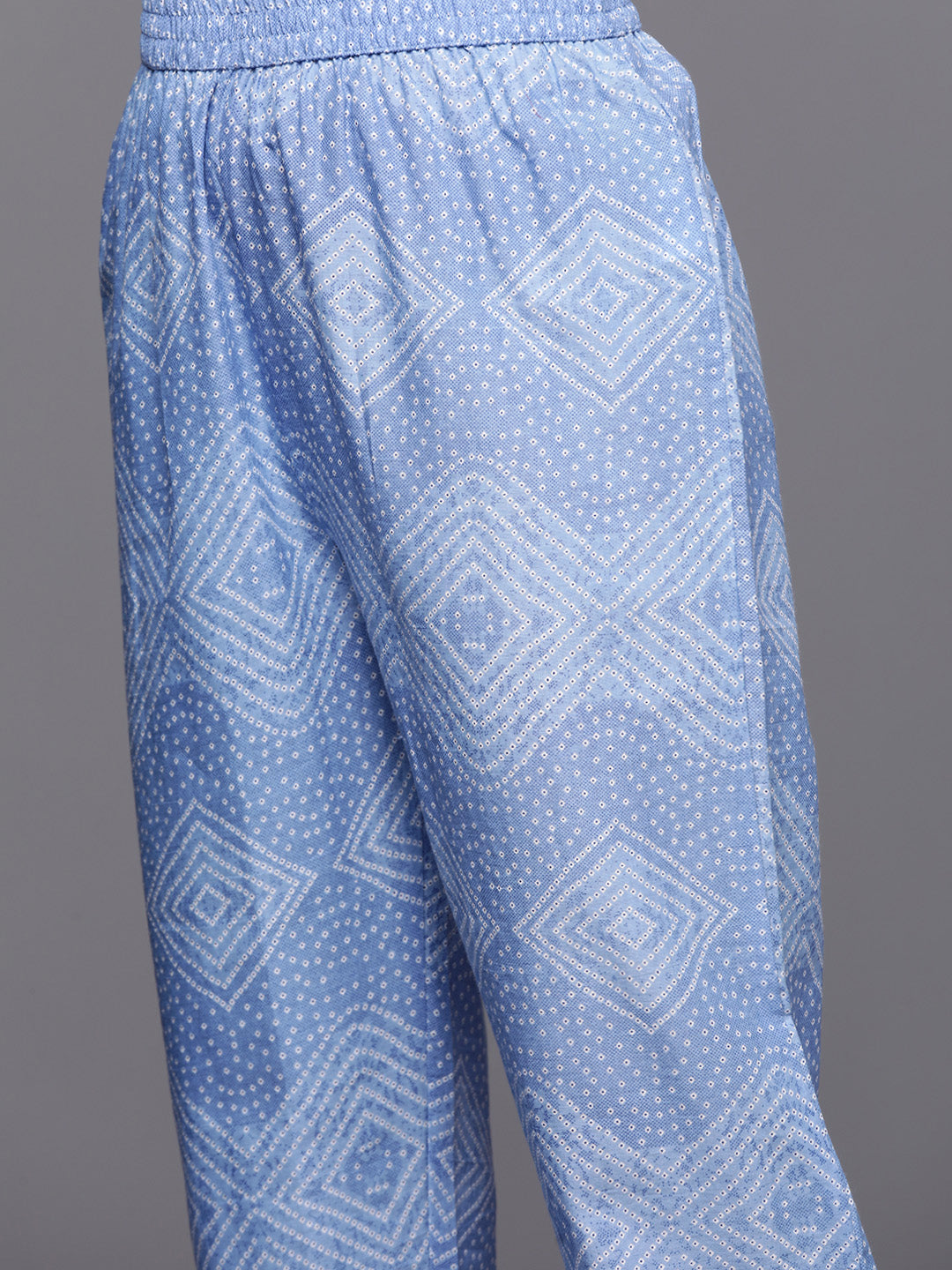 Dhiyona VR Women's Blue Bandhani Printed Kurta Spaghetti Strap With Drawstring Paired With Tonal Printed Bottom