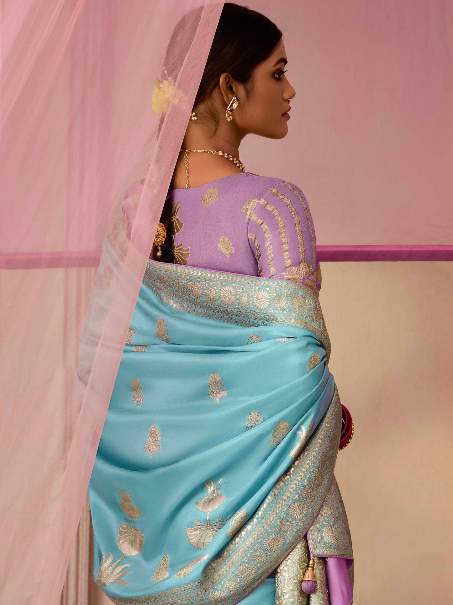 Dhiyona KM Women Elegant Aqua Blue Dola Silk Saree With Purple Golden Work Blouse