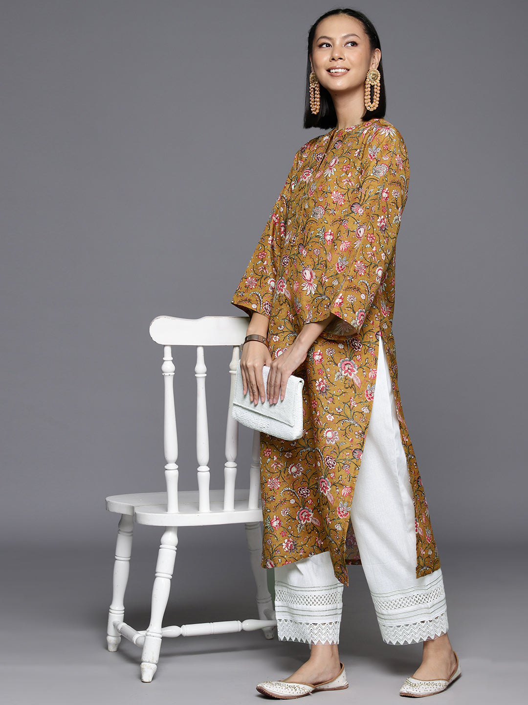 Dhiyona VR Women's Mustard Floral Printed Straight Kurta With Flared Sleeves