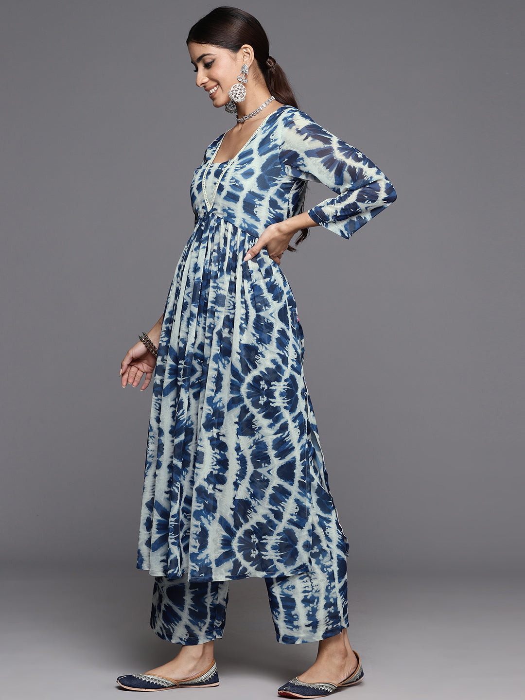 Dhiyona VR Women's Blue Shibori Printed V-Neck A-Line Kurta Paired With Tonal Printed Bottom