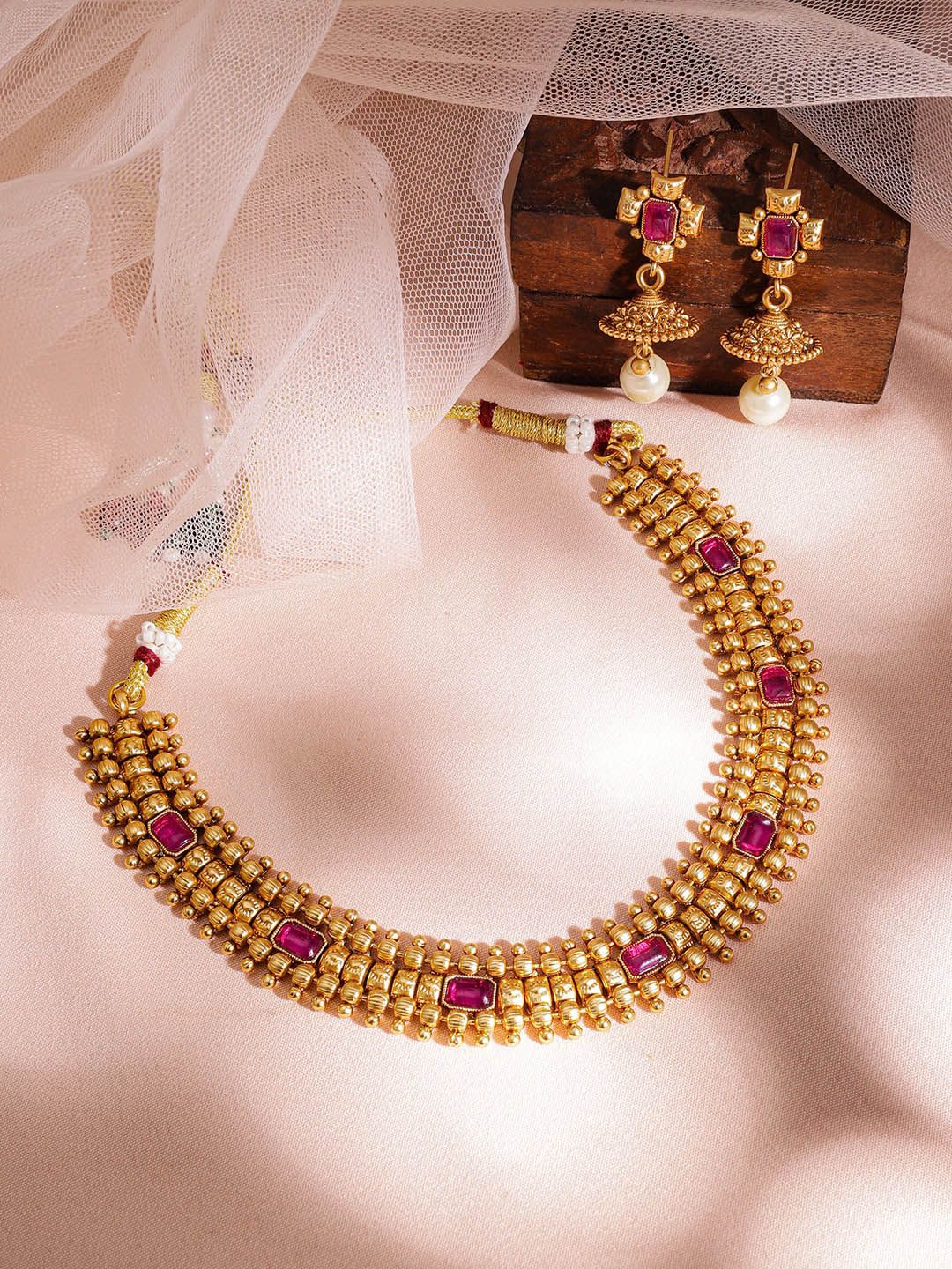 Dhiyona RJ Women's 22K Gold Plated Handcrafted Ruby Stone Studded and Gold Beaded Jewellery Set
