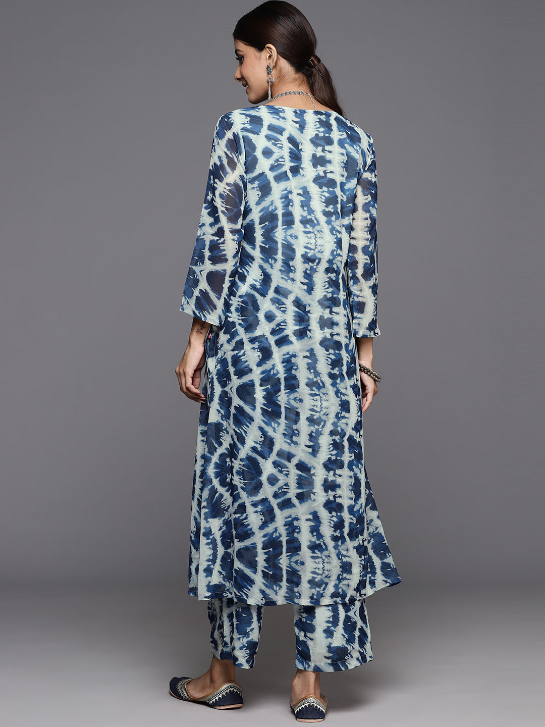 Dhiyona VR Women's Blue Shibori Printed V-Neck A-Line Kurta Paired With Tonal Printed Bottom