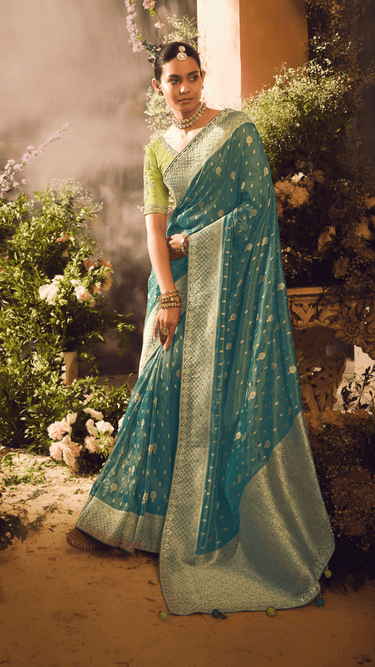 Dhiyona KM Women Teal Blue Banarasi Zari Tissue Saree “ A Dreamy Drape By Kimora