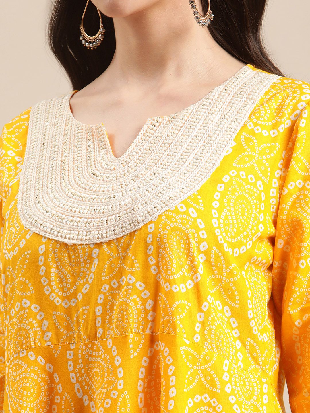 Dhiyona VA Women's Mustard And White Bandhej Printed Flared Kurti With Sharara With Dupatta.