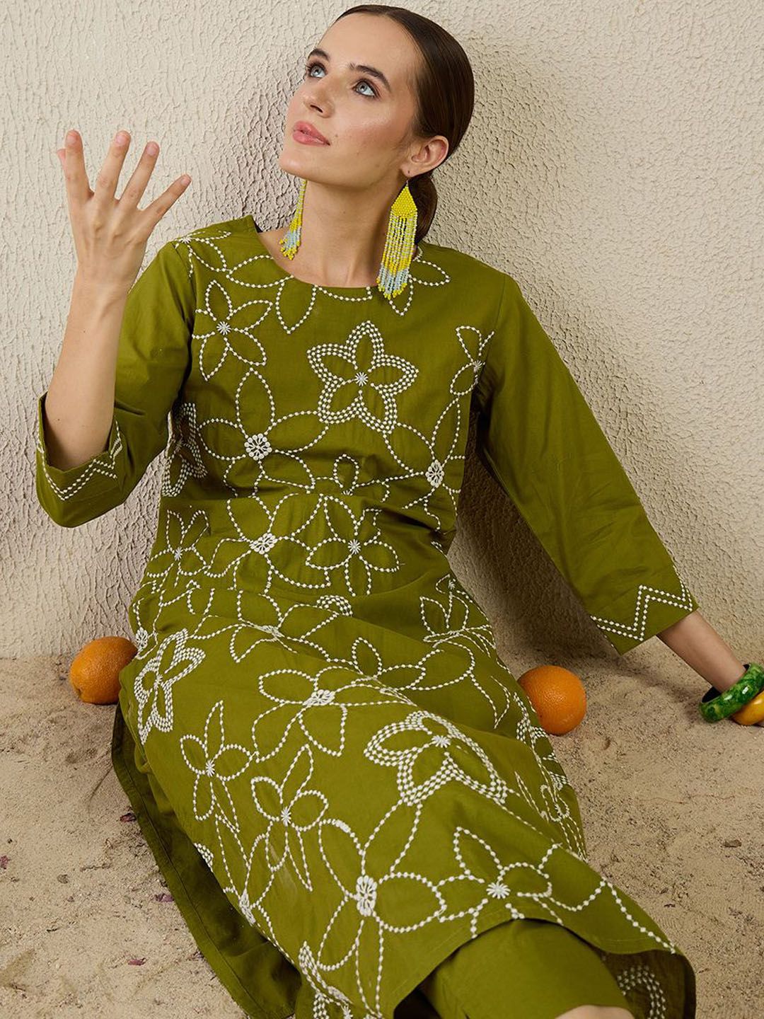 Women Floral Embroidered Cotton Kurta with Trousers