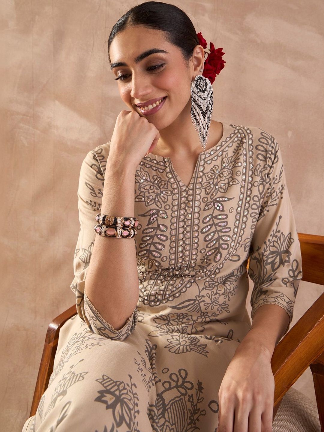 Women Ethnic Motifs Printed Regular Sequinned Kurta with Trousers