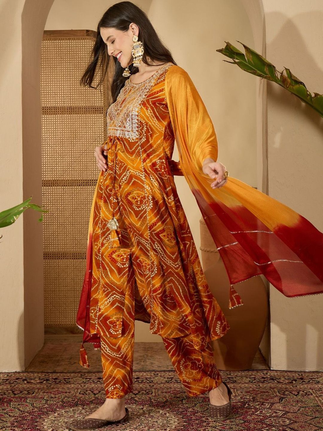 Dhiyona SN Women's Bandhani Printed Sequinned A-Line Kurta With Trousers & Dupatta