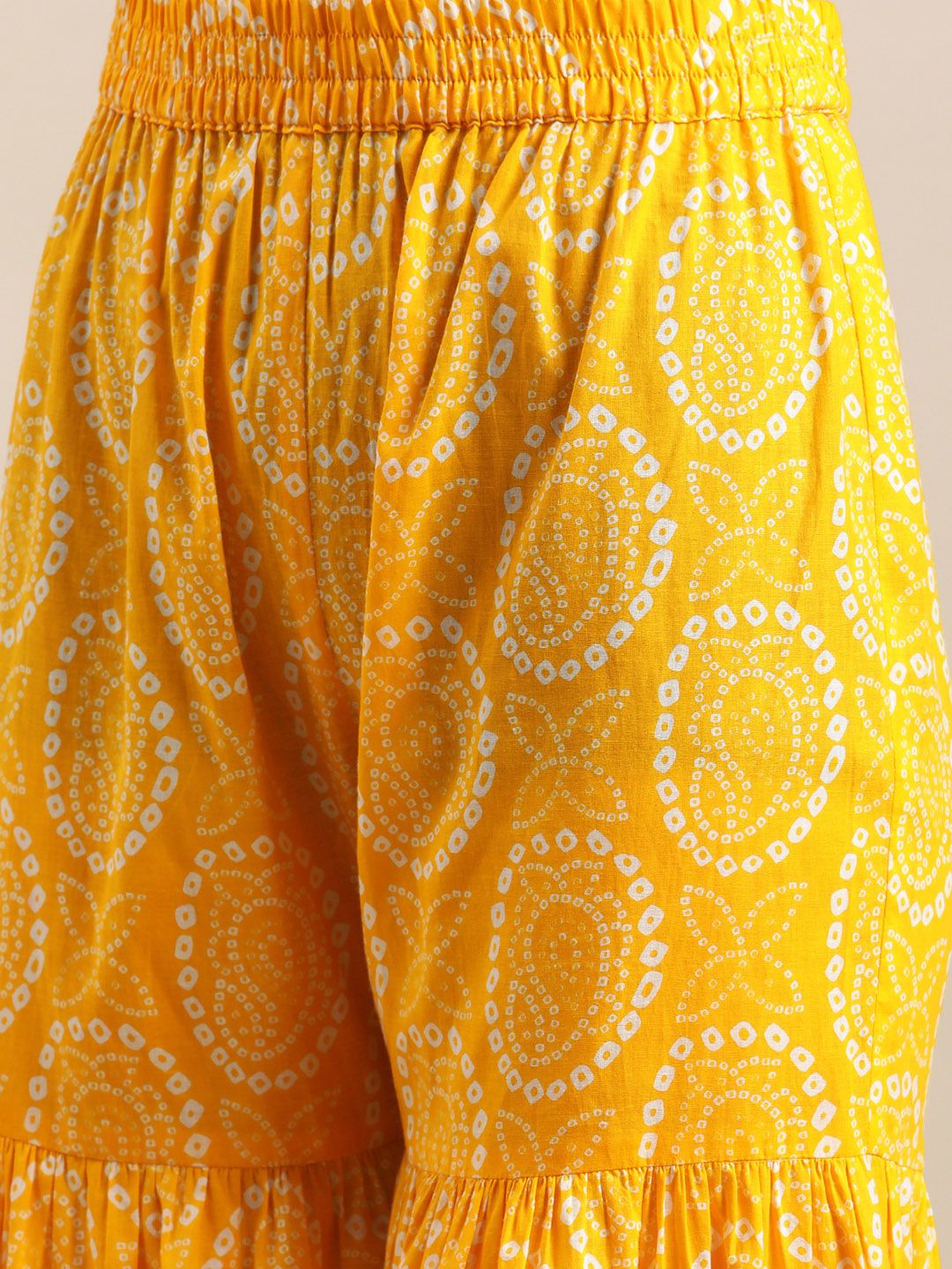 Dhiyona VA Women's Mustard And White Bandhej Printed Flared Kurti With Sharara With Dupatta.