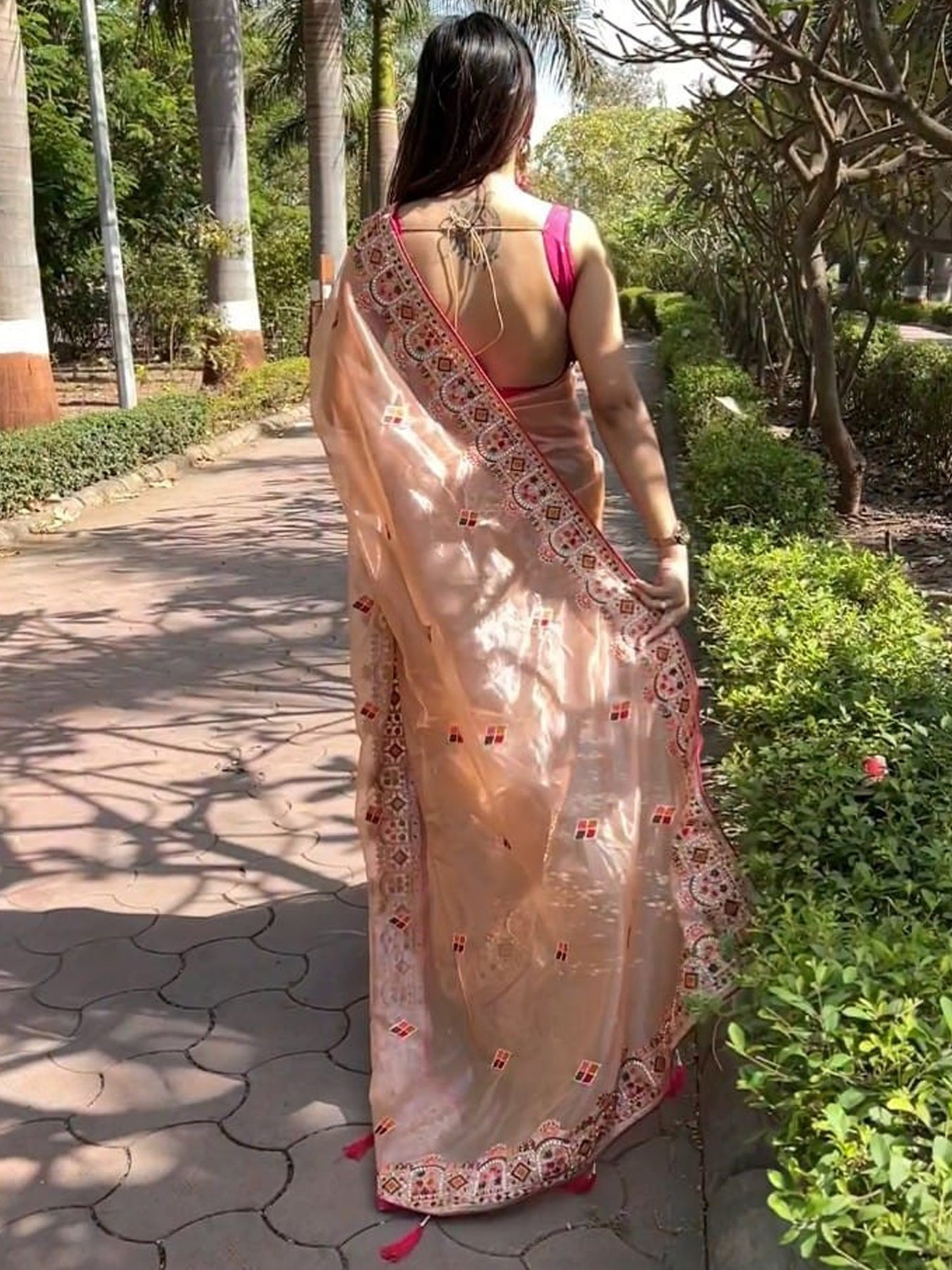 Women's Tissue Peach Embellished Designer Saree With Blouse Piece
