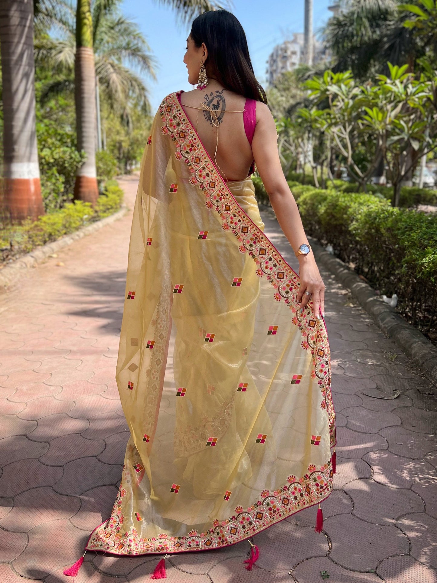 Women's Tissue Yellow Embellished Designer Saree With Blouse Piece