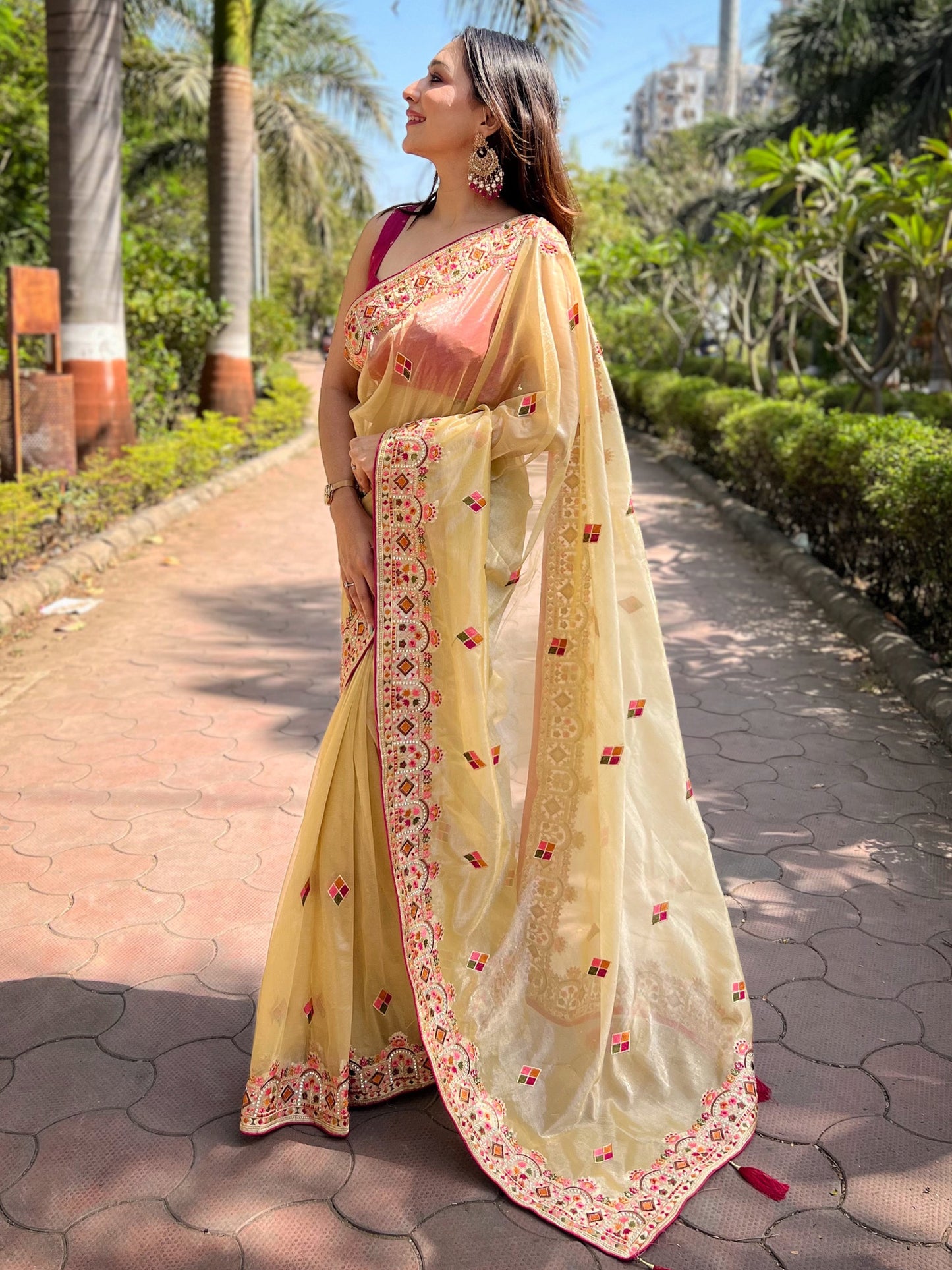 Women's Tissue Yellow Embellished Designer Saree With Blouse Piece