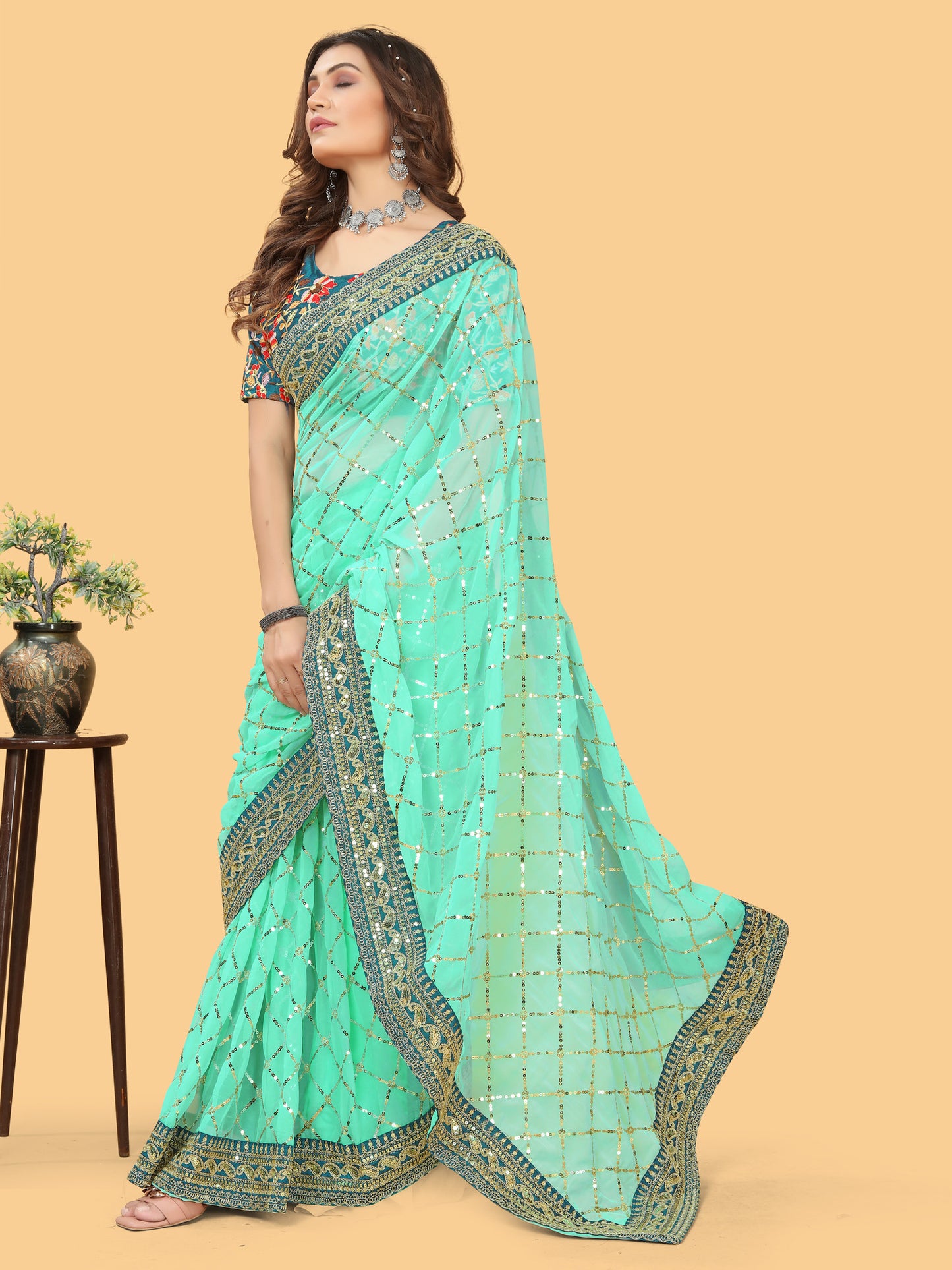 Women's Georgette Turquoise Embellished Designer Saree With Blouse Piece
