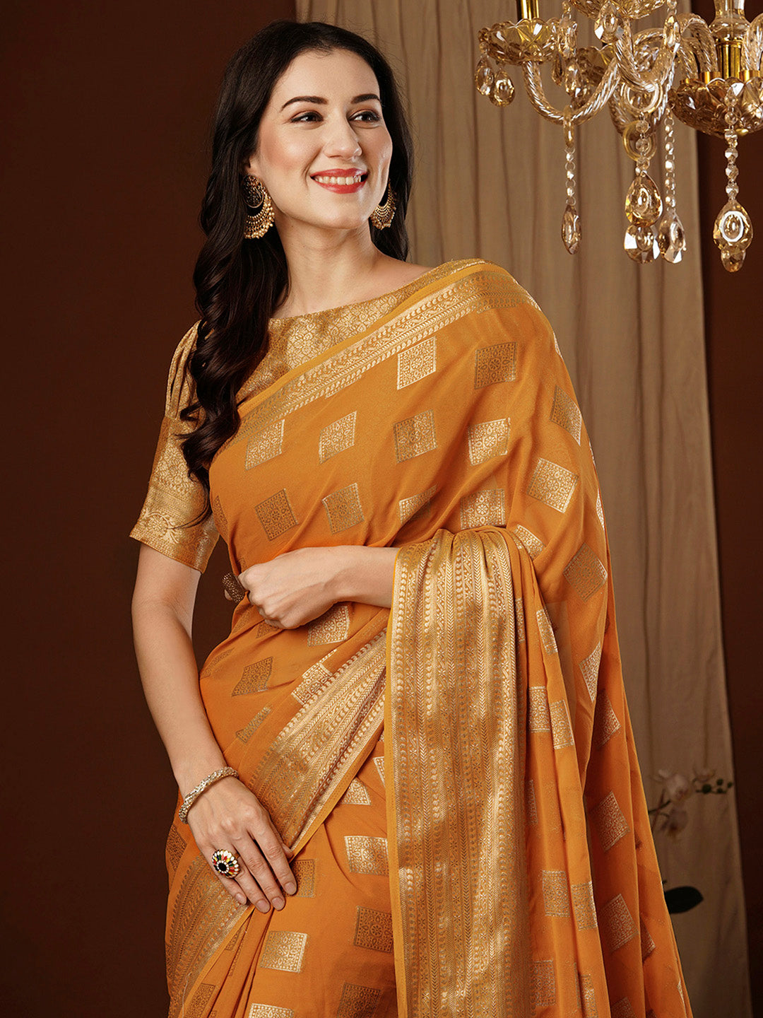 Women's Georgette Orange Woven Design Designer Saree With Blouse Piece