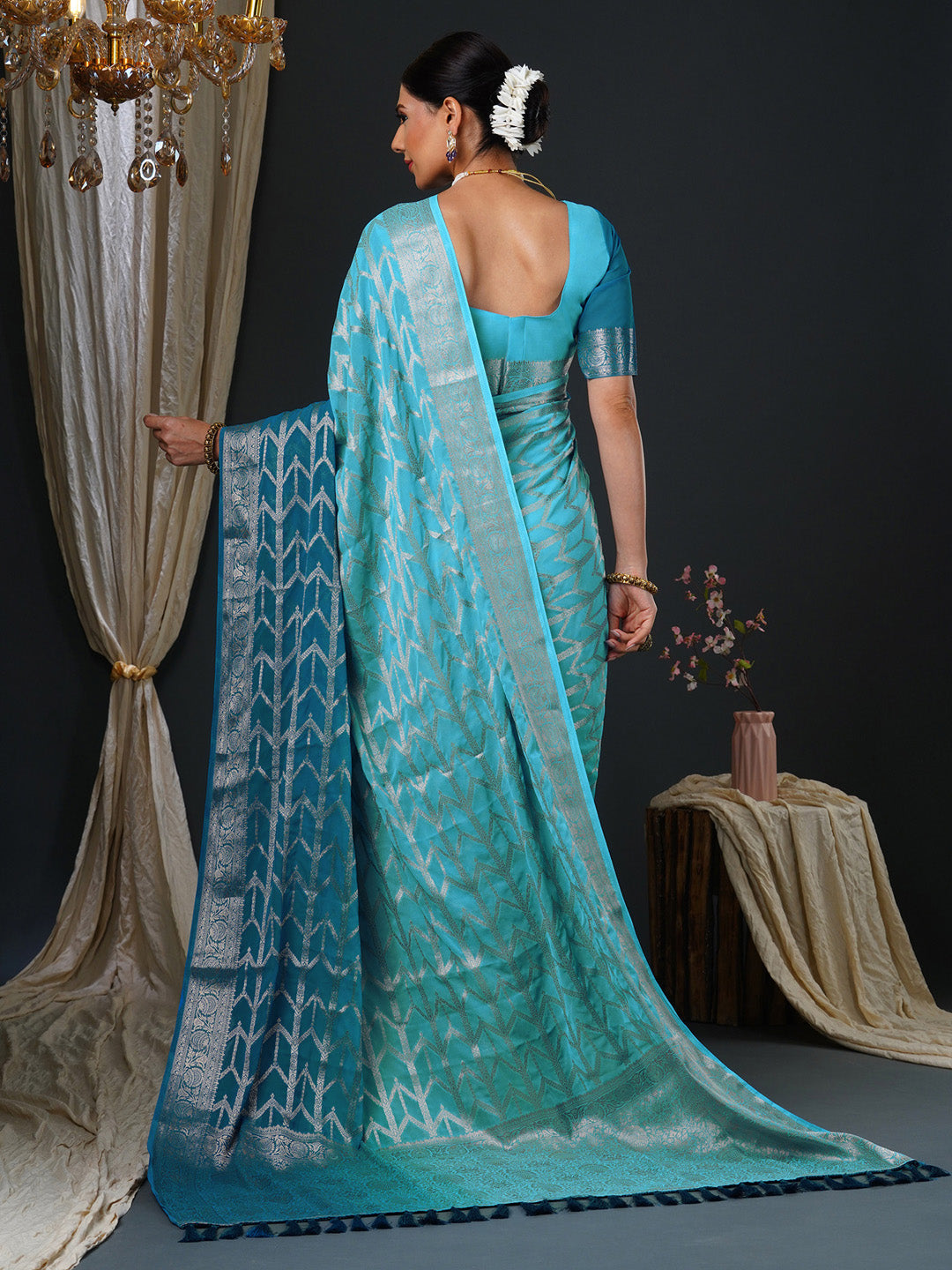 Women's Georgette Light Blue Woven Design Designer Saree With Blouse Piece