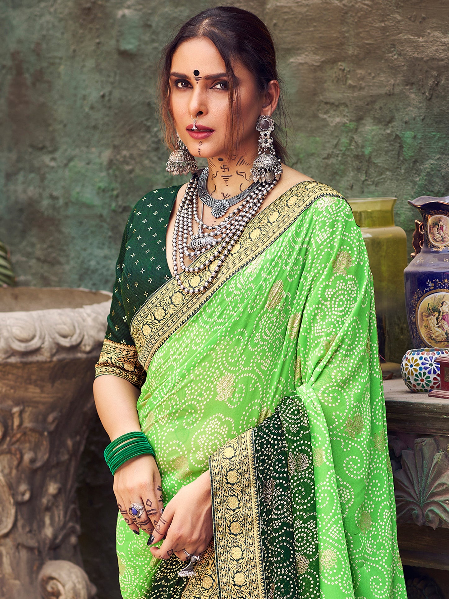 Women's Georgette Light Green Embellished Designer Saree With Blouse Piece