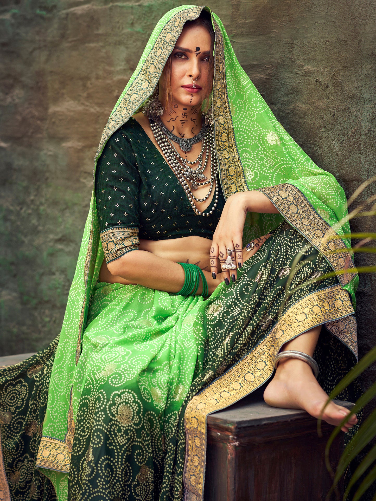 Women's Georgette Light Green Embellished Designer Saree With Blouse Piece