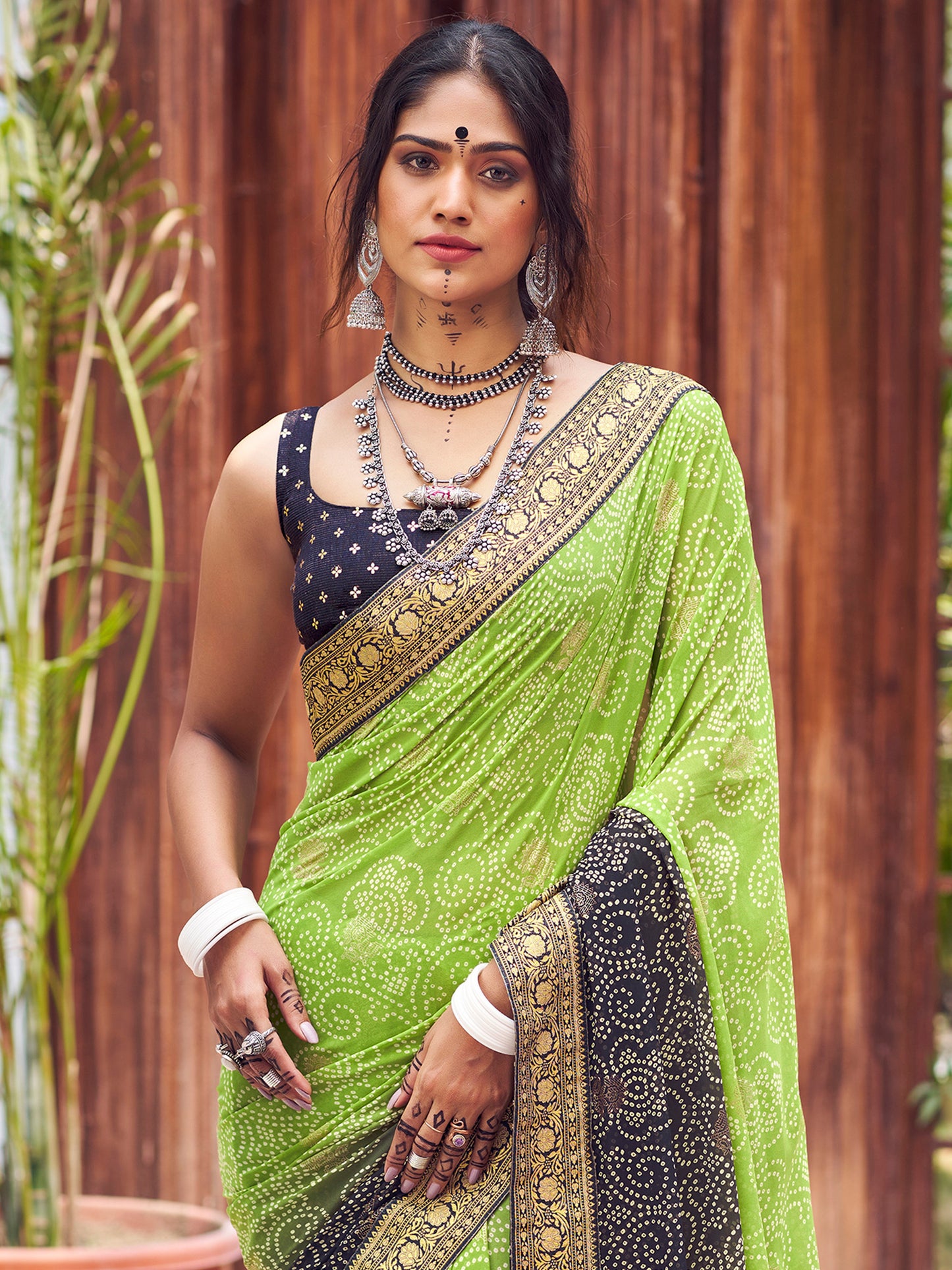 Women's Georgette Light Green Embellished Designer Saree With Blouse Piece