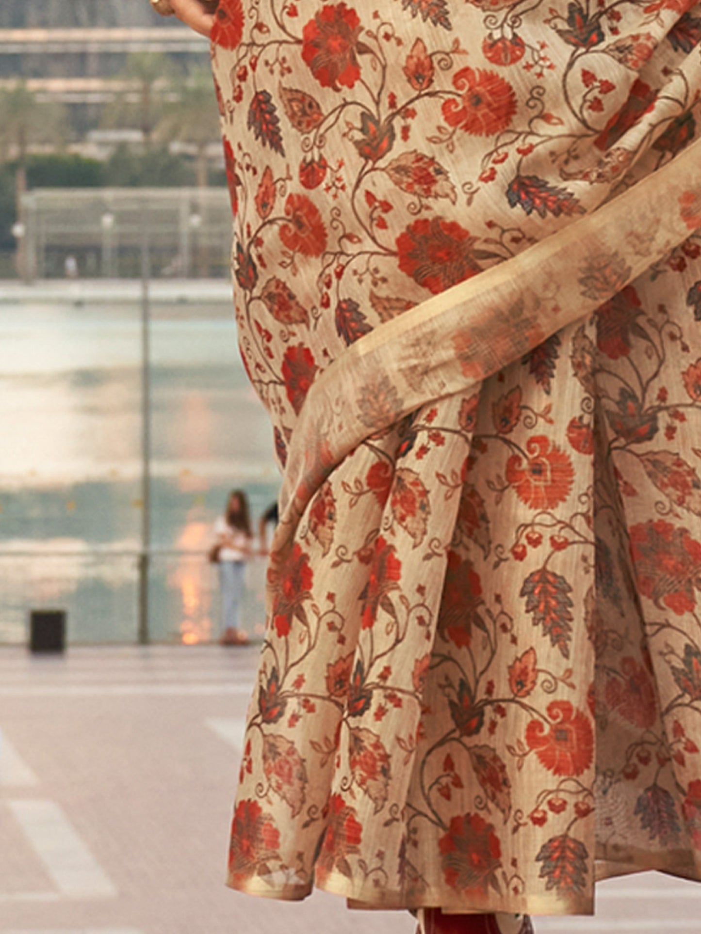 Women's Tissue Cream Printed Designer Saree With Blouse Piece