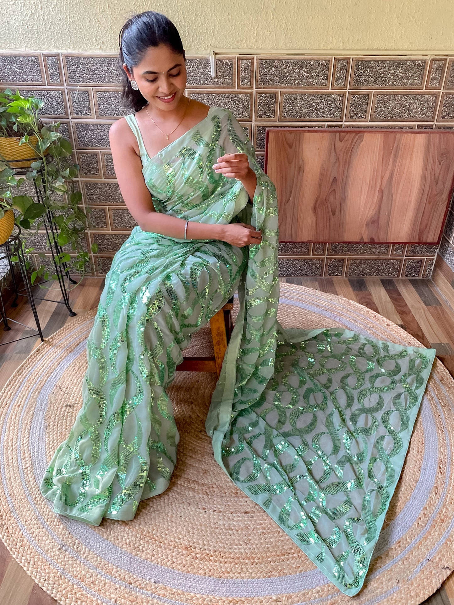 Women's Georgette Light Green Embellished Designer Saree With Blouse Piece