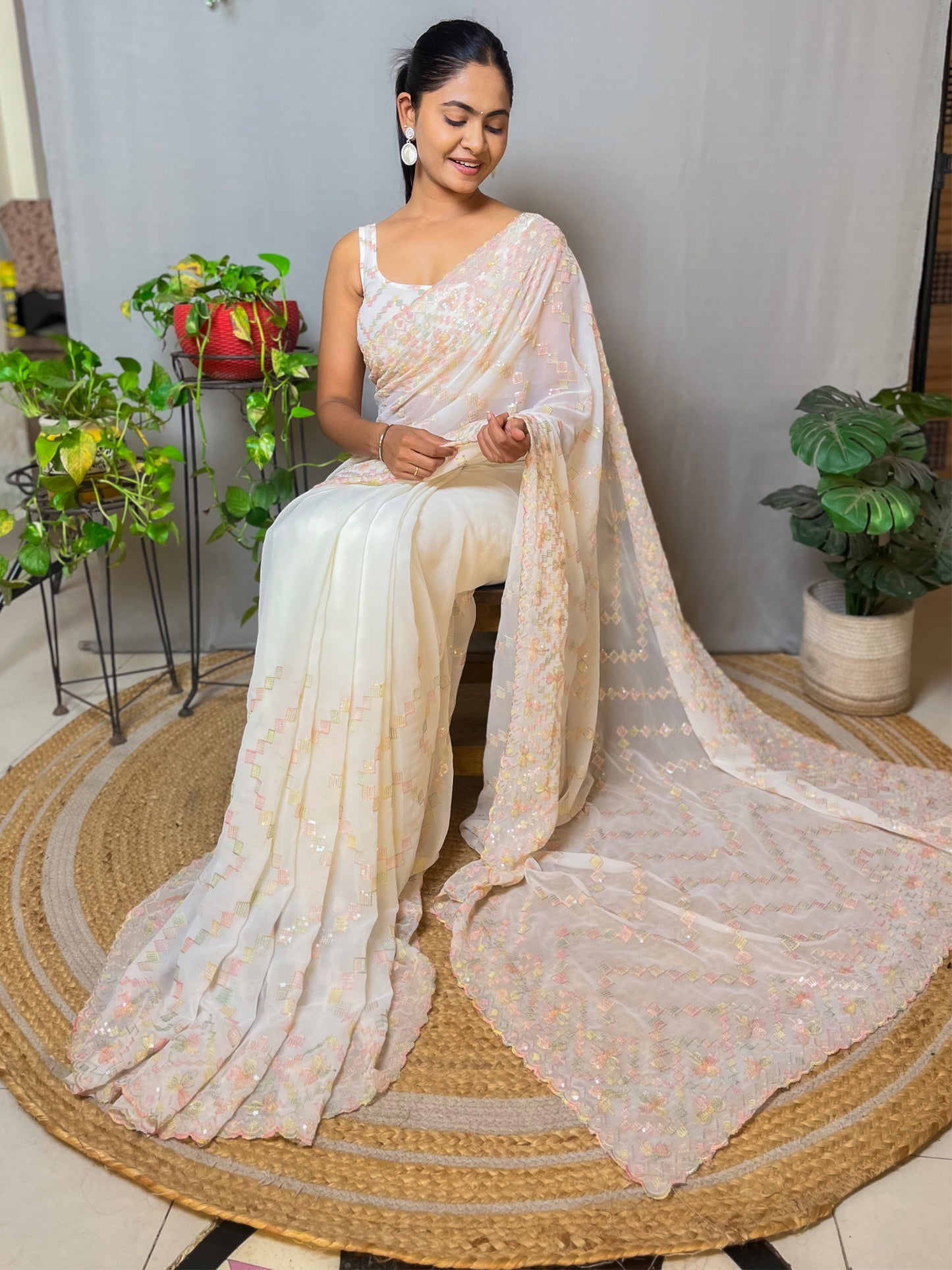 Women's Georgette Cream Embellished Designer Saree With Blouse Piece