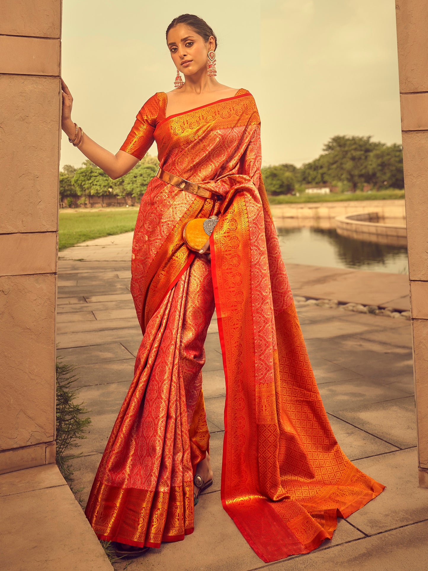 Women's Silk Blend Peach Woven Design Designer Saree With Blouse Piece