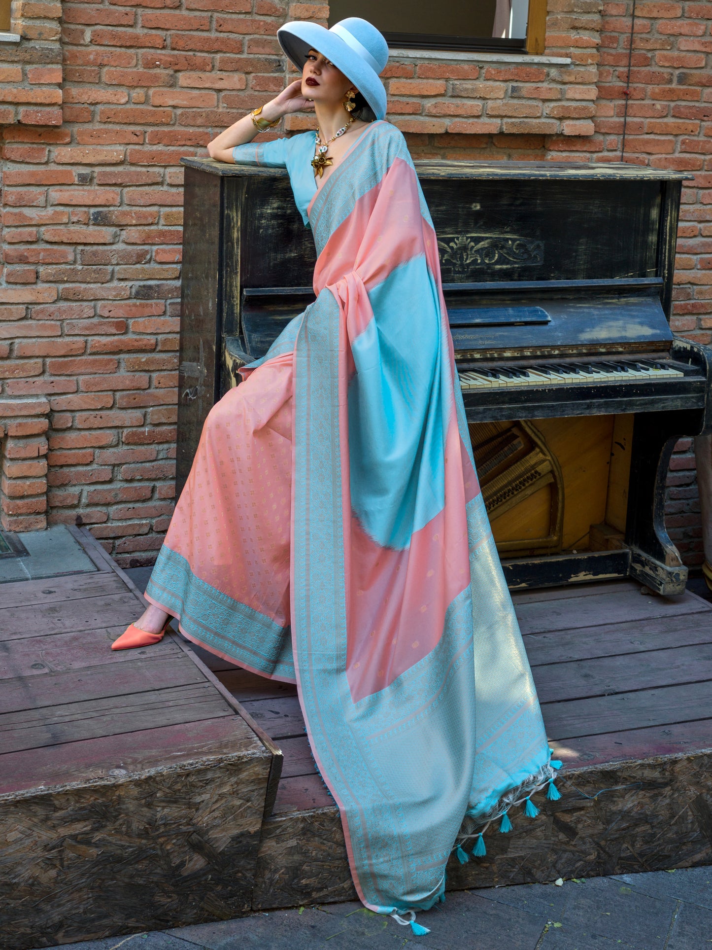 Women's Soft Silk Peach Woven Design Designer Saree With Blouse Piece