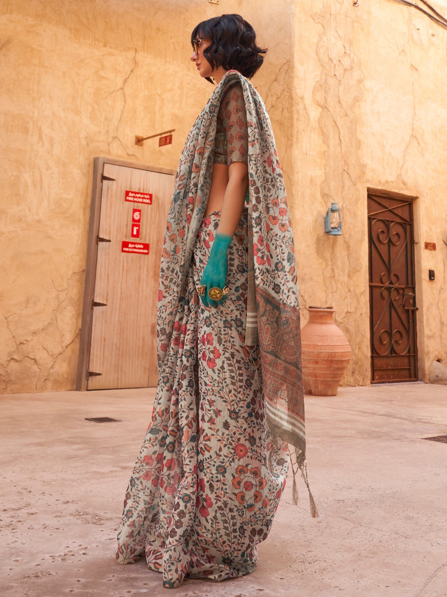 Women's Tissue Light Blue Printed Designer Saree With Blouse Piece