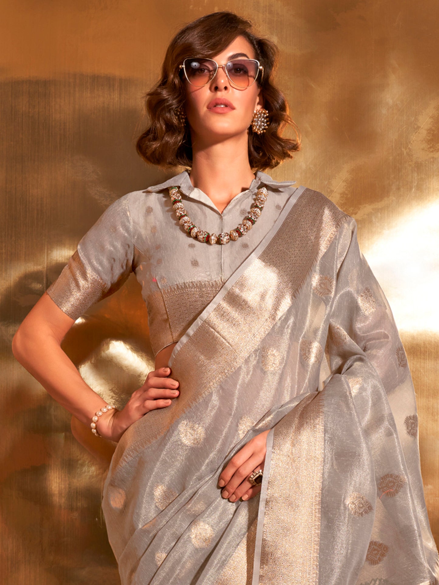 Women's Tissue Grey Woven Design Designer Saree With Blouse Piece