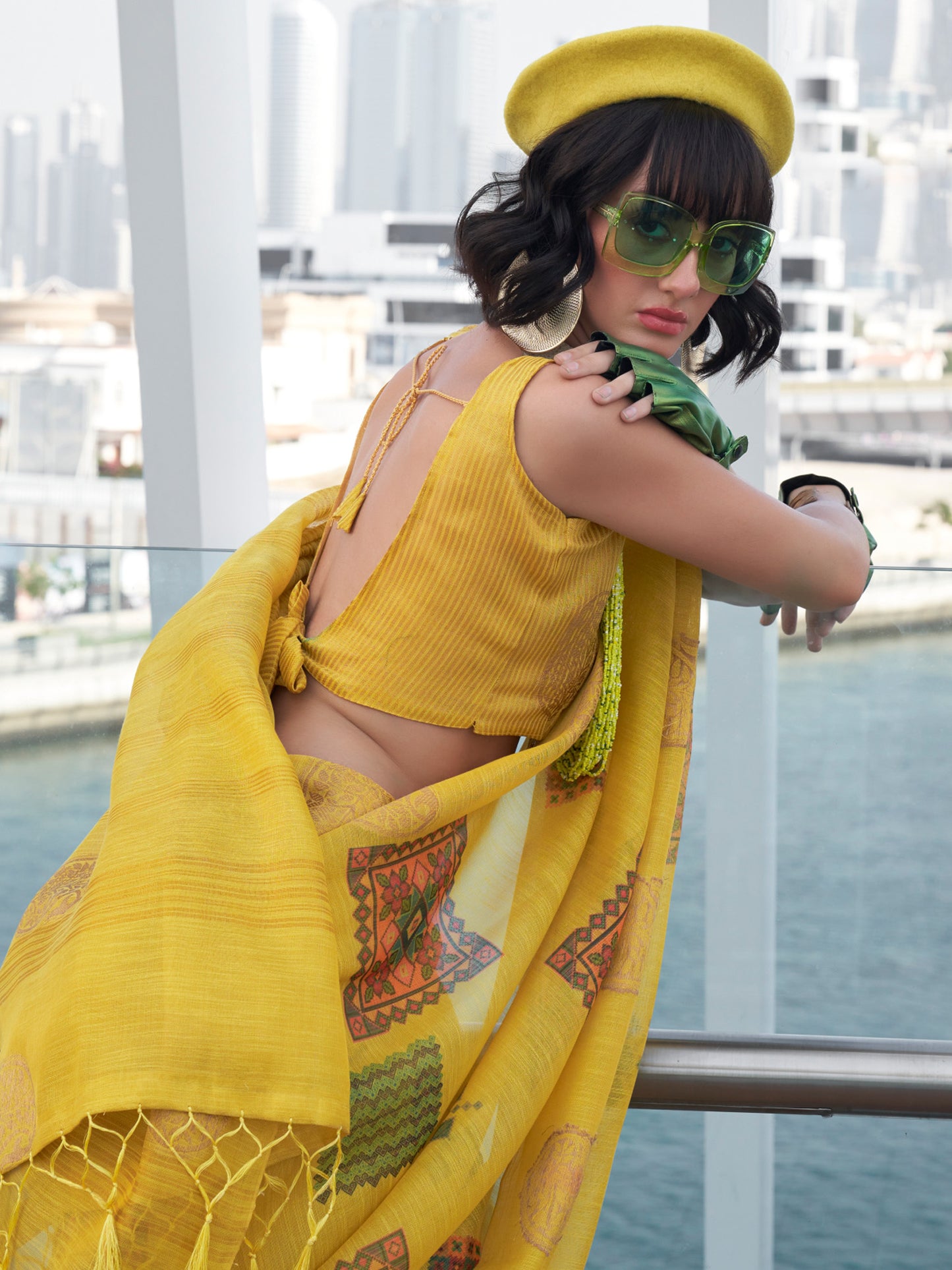 Women's Tissue Yellow Woven Design Designer Saree With Blouse Piece