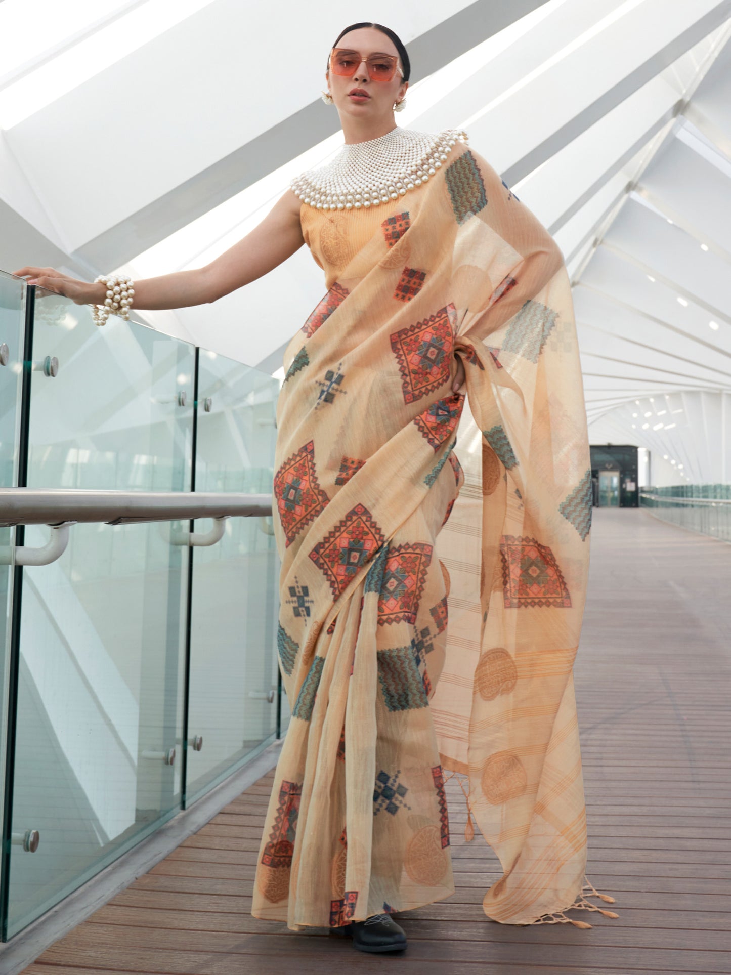 Women's Tissue Cream Woven Design Designer Saree With Blouse Piece